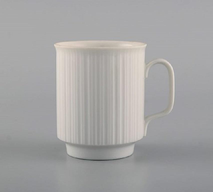 Scandinave moderne Quatre tasses à moka en porcelaine Noire avec soucoupes de Tapio Wirkkala pour Rosenthal en vente