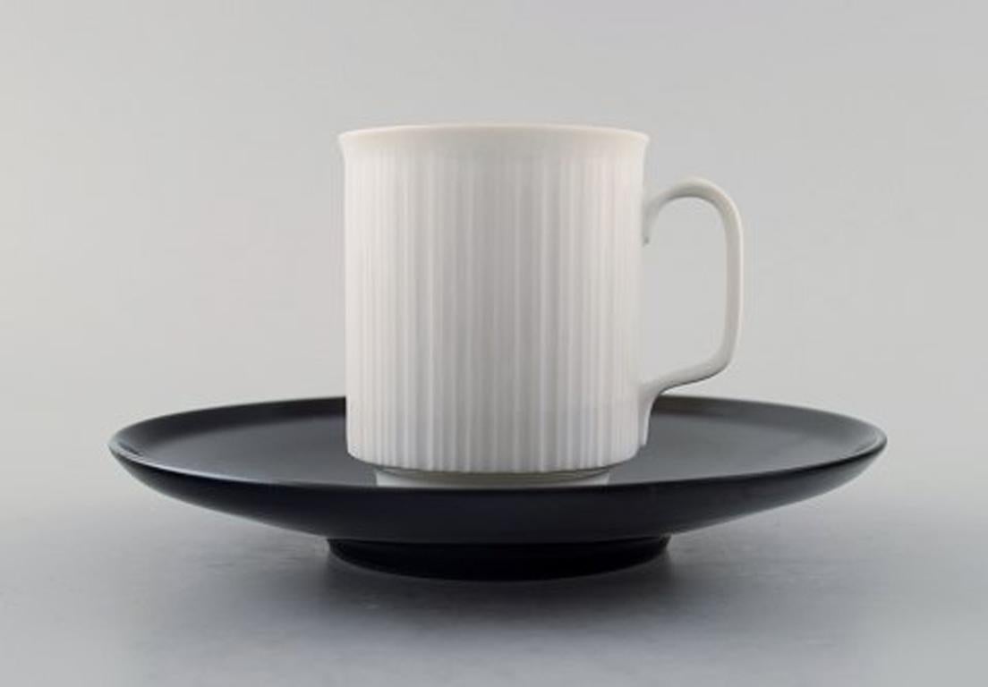Tapio Wirkkala for Rosenthal Studio-line porcelain noire, ten piece coffee / mocha service in black and white porcelain, modern design, fluted. Designed in 1962.
Consisting of ten coffee cups with saucers.
The coffee cup measures 6.3 x 5.3 cm. The