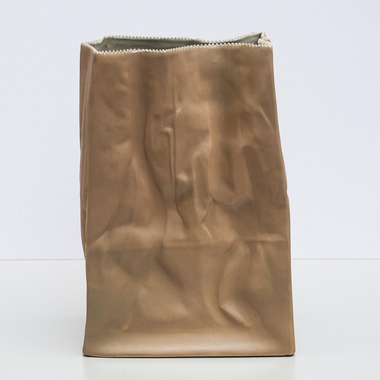 Rare large paper bag vase designed by Tapio Wirkkala and manufactured by Rosenthal, Germany 1977. This vase is made of porcelain (stoneware) and looks like a paper bag. The vase is made in the pop art period and it is very decorative especially in