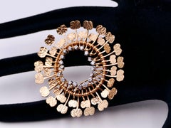 Tapio Wirkkala kinetic gold brooch "Aurinko"