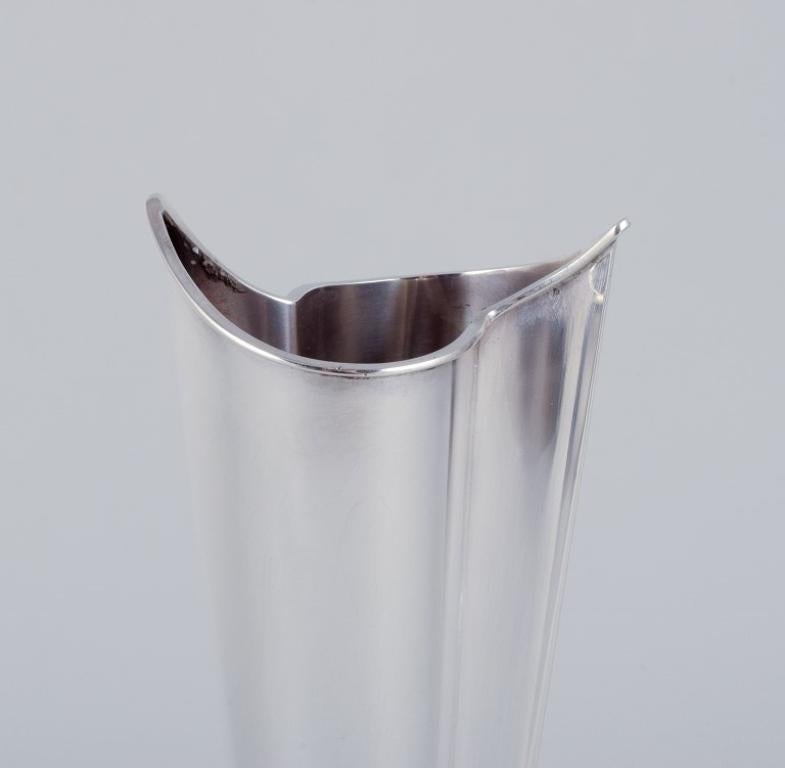 Scandinavian Modern Tapio Wirkkala. Modernist silver vase on a rosewood base. 1963 For Sale