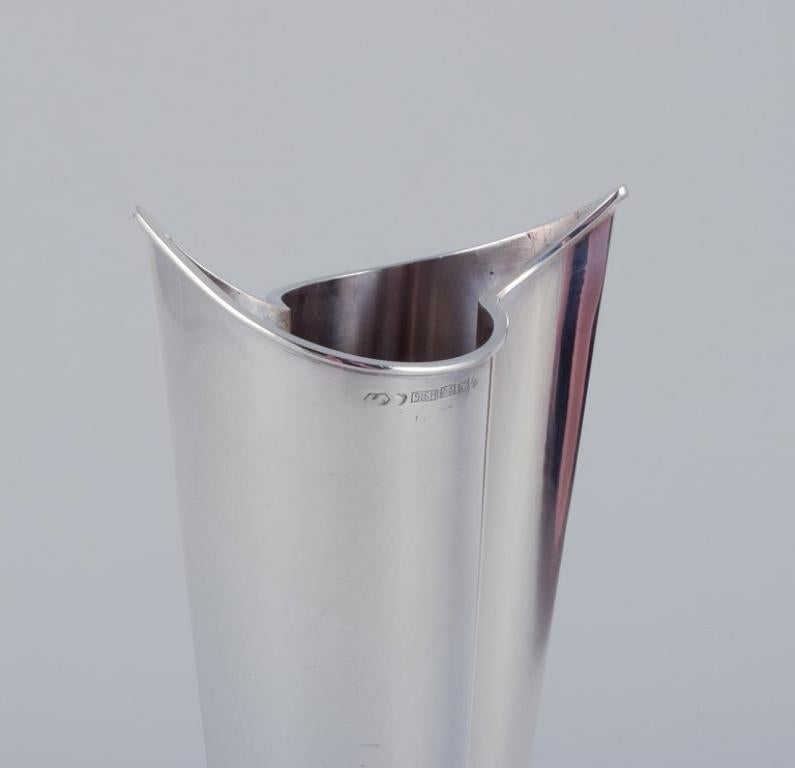 Finnish Tapio Wirkkala. Modernist silver vase on a rosewood base. 1963 For Sale
