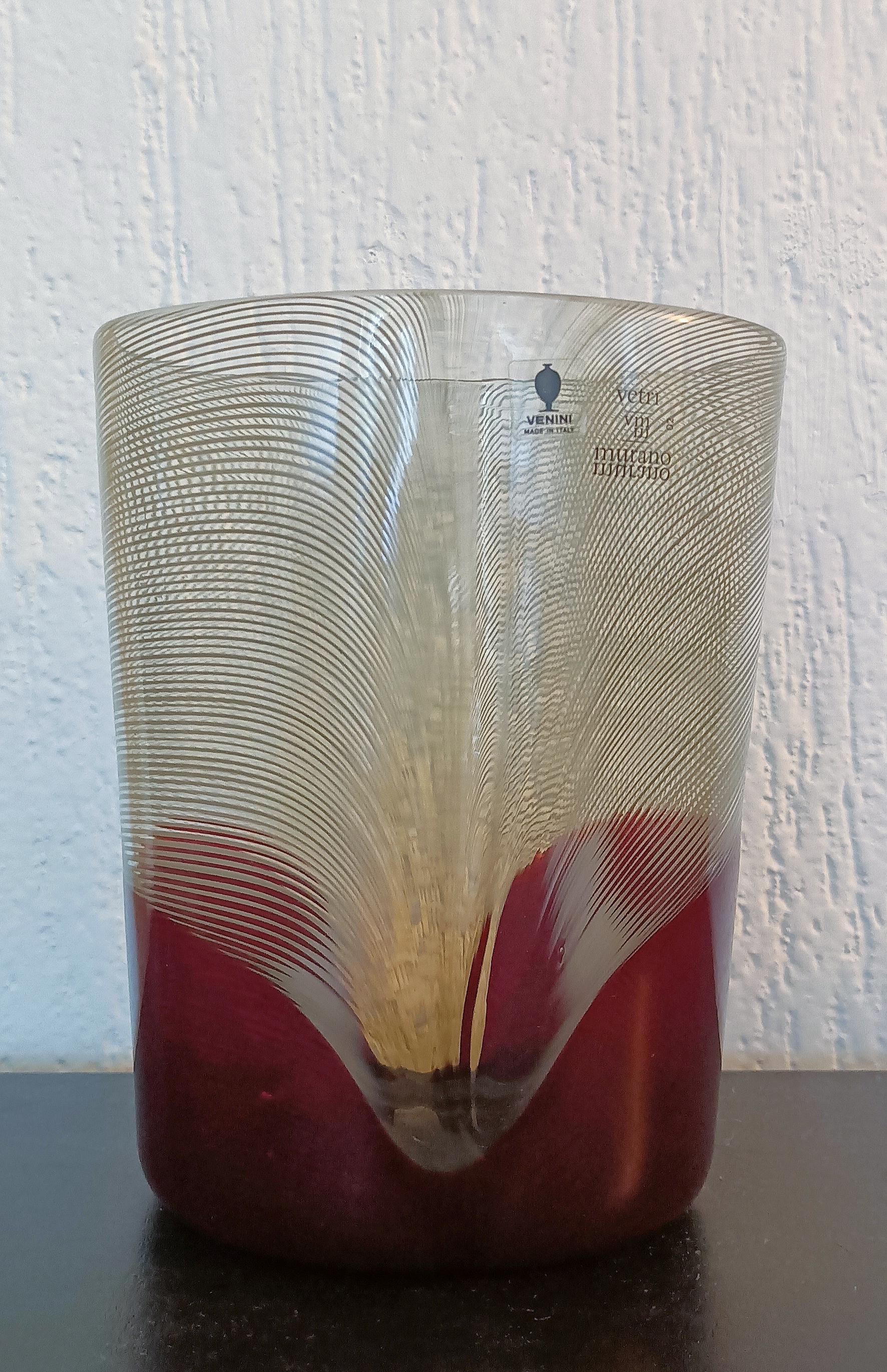 Tapio Wirkkala Pavoni vase designed for Venini, Murano in 1982.
Signed on the bottom: Venini Italia TW 82 and signed with decal label to side: Vetri VM Murano 02 Venini Made in Italy.

Bibliography: Venini Glass: Catalogue 1921-2007, Deboni, pl.
