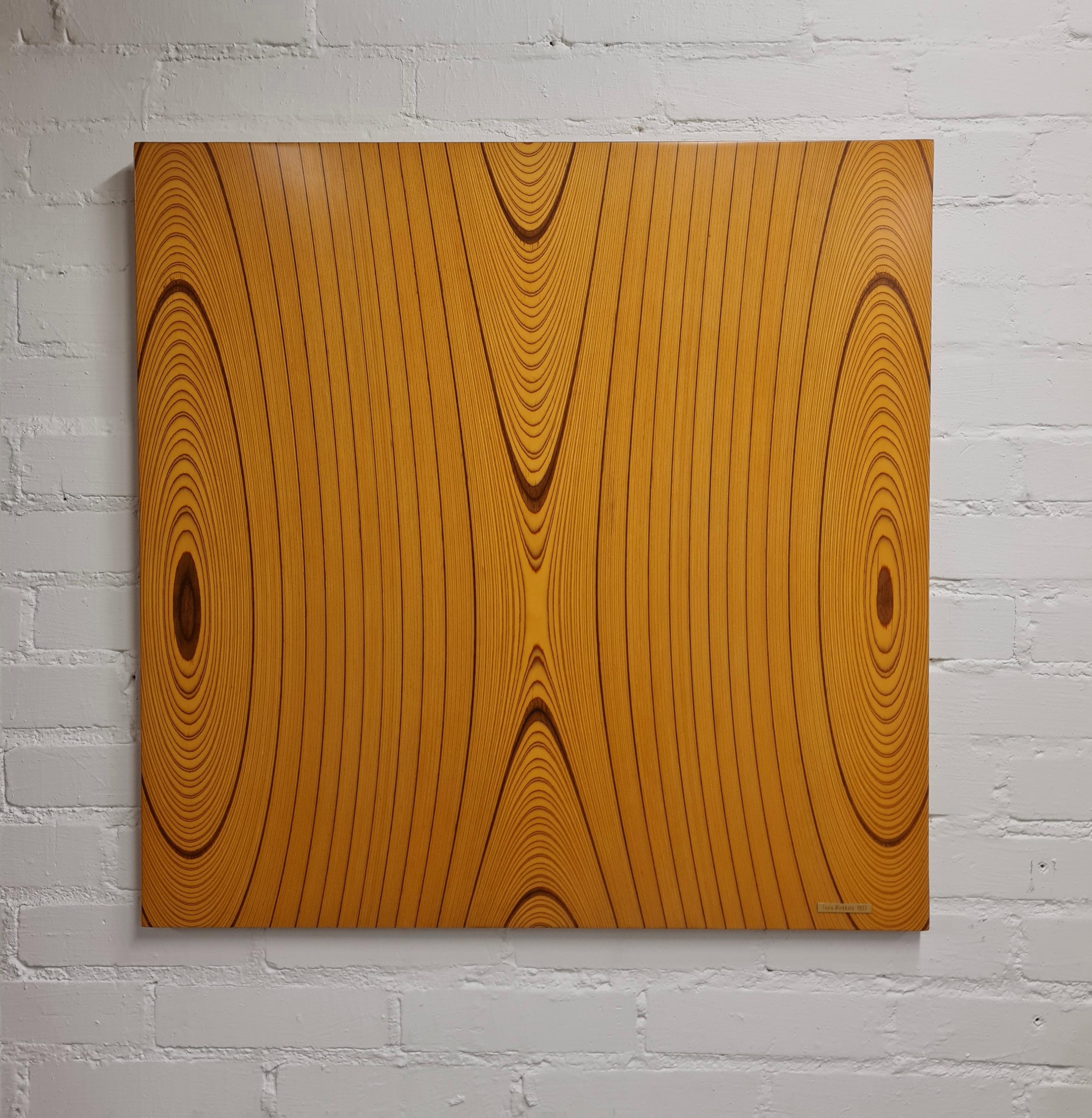 A rare version of the Tapio Wirkkala rhythmic veneer coffee table turned into wall hanging. The model is 9018, and aka Angel Wings due to the symmetric wing resembling rhytmic lines on top. 

The table is in beautiful condition and is stamped with
