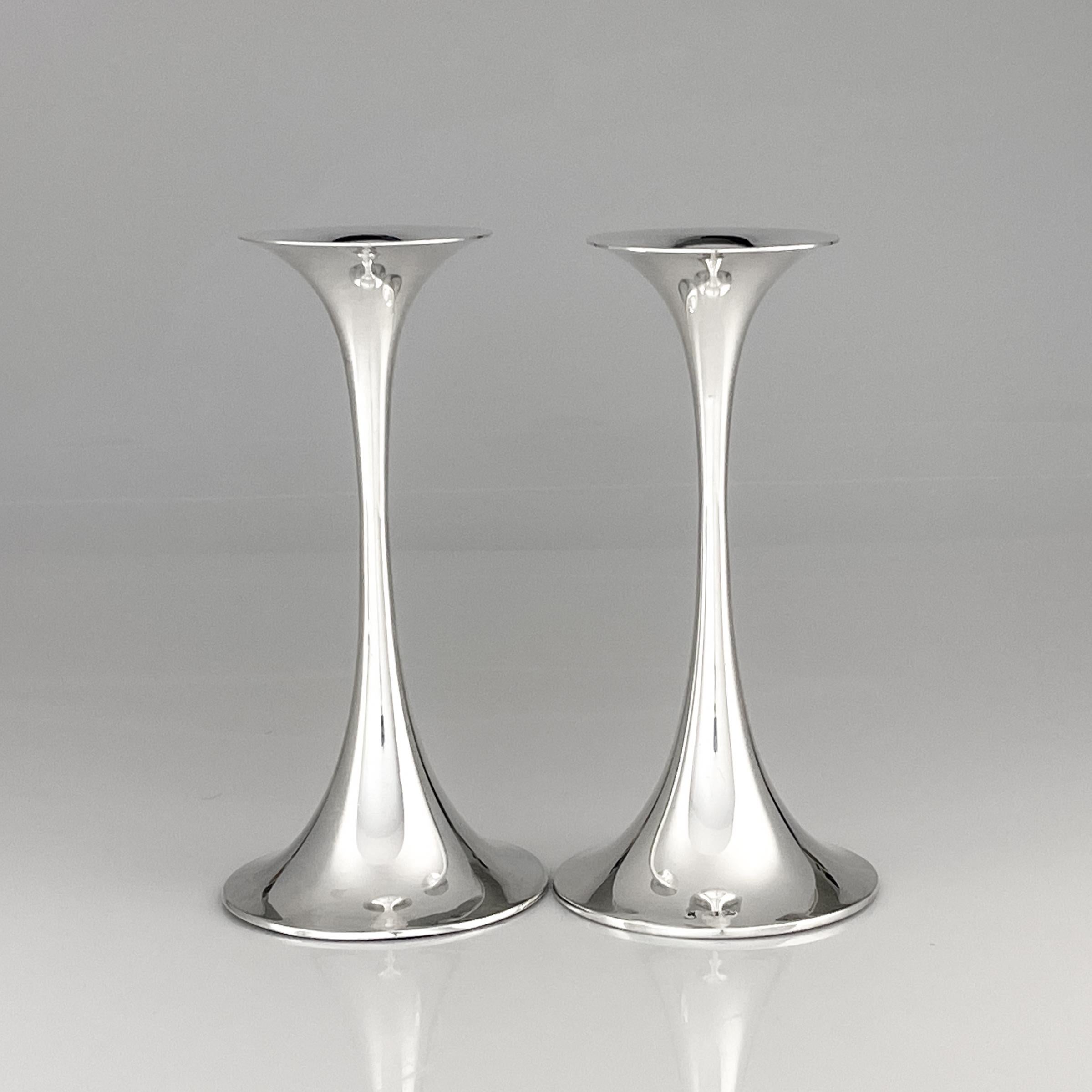 Tapio Wirkkala Scandinavian modern silver Trumpetti candlesticks Finland 1970's

A pair of Sterling silver “Trumpetti” candlesticks, model TW 284. Designed by Tapio Wirkkala in 1963 and executed by the craftsmen of Kultakeskus in the 1970’s.

This