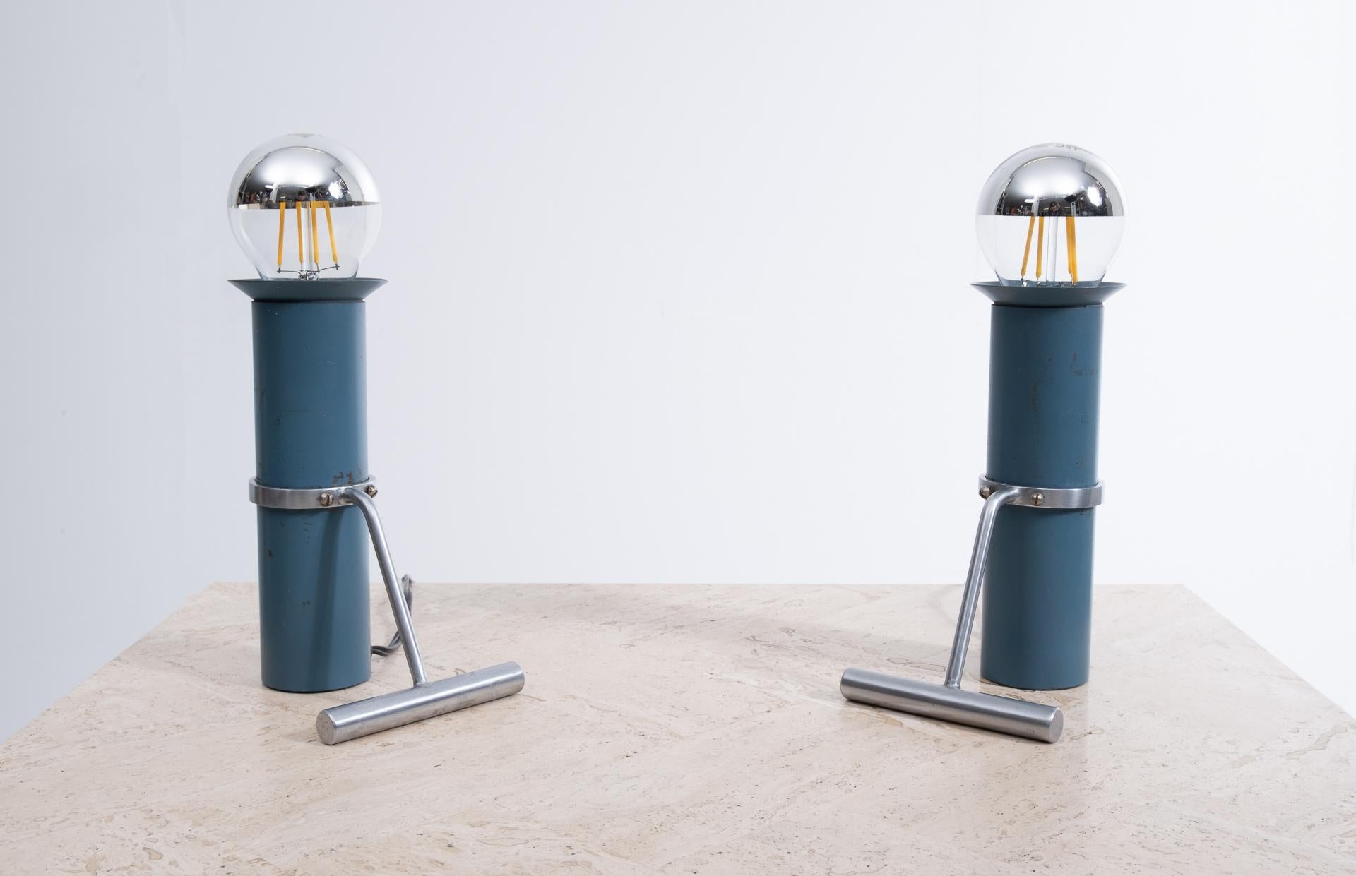 Two beautiful table lamps. Design by Tapio Wirkkala for Idman, Finland, 1960s. Petrol blue metal cylinder base
comes with polished steel feet. Completely original.