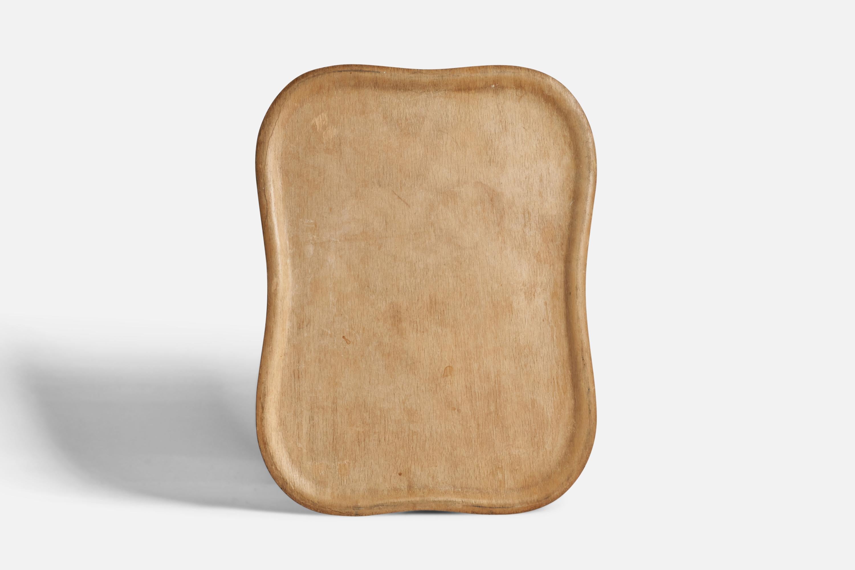 A birch plywood tray designed by Tapio Wirkkala and produced by Soinne & Knioy, Finland, 1950s