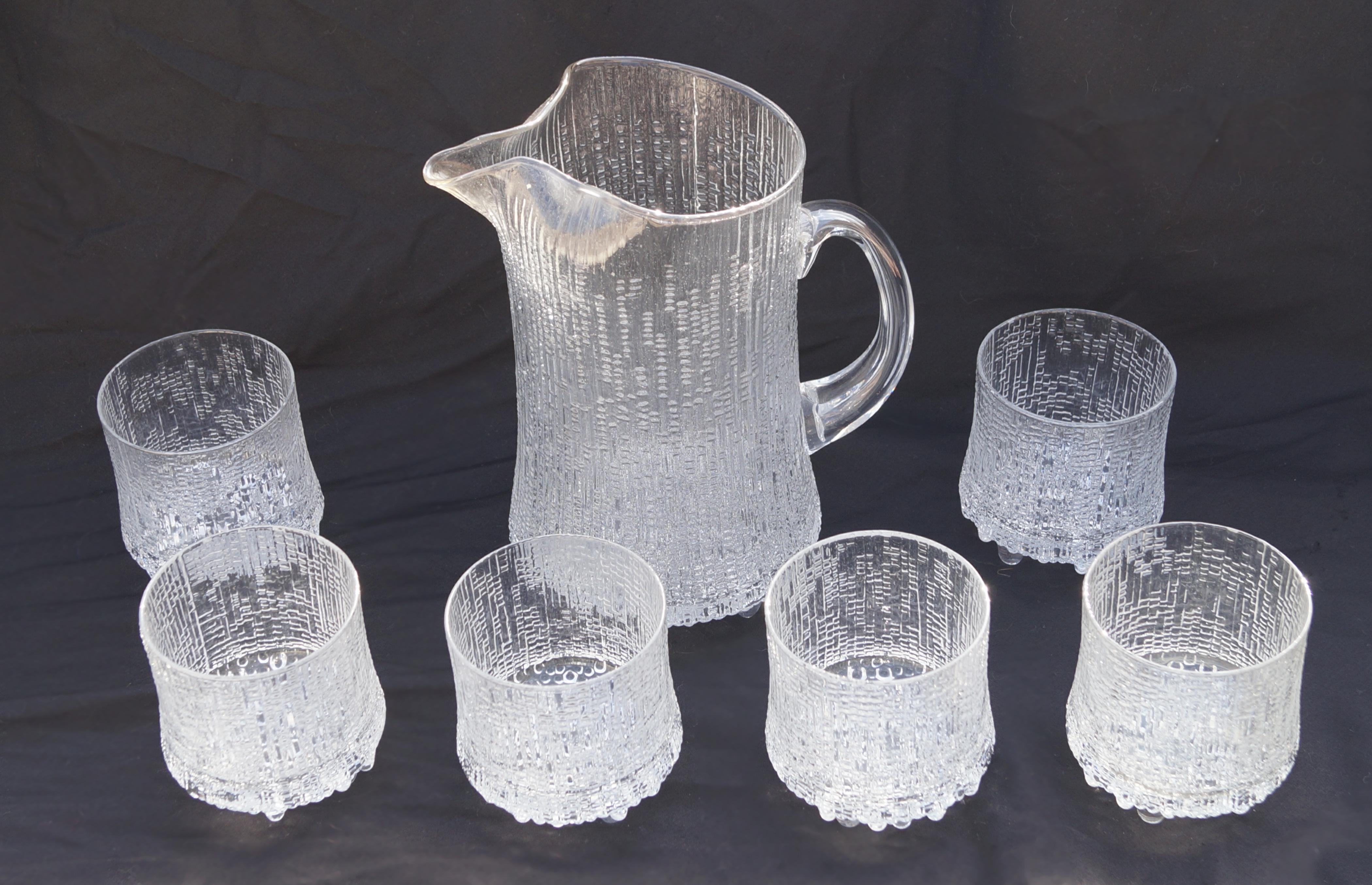 Set of Tapio Wirkkala Ultima Thule Glass Pitcher and 6 Either on the Rocks or Double Old Fashioned Glasses ( measurements are very close on both, so not certain which they are) from Finland the lip is approx 3 1/8