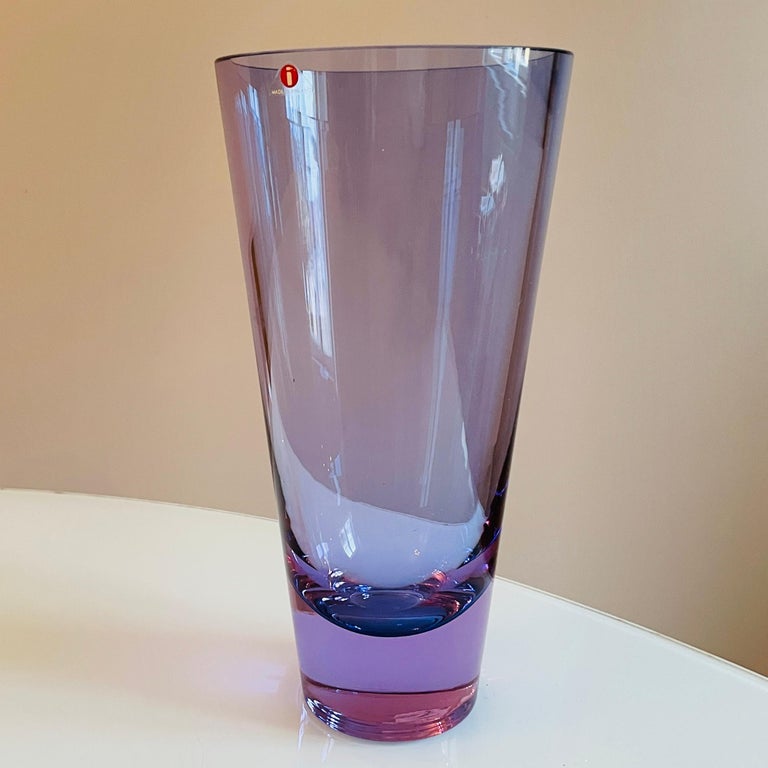 Iittala’s vase 3647 was designed by Tapio Wirkkala. The stick-blown glass vase is made of light purple glass. Made in Finland by Iittala and sign. 