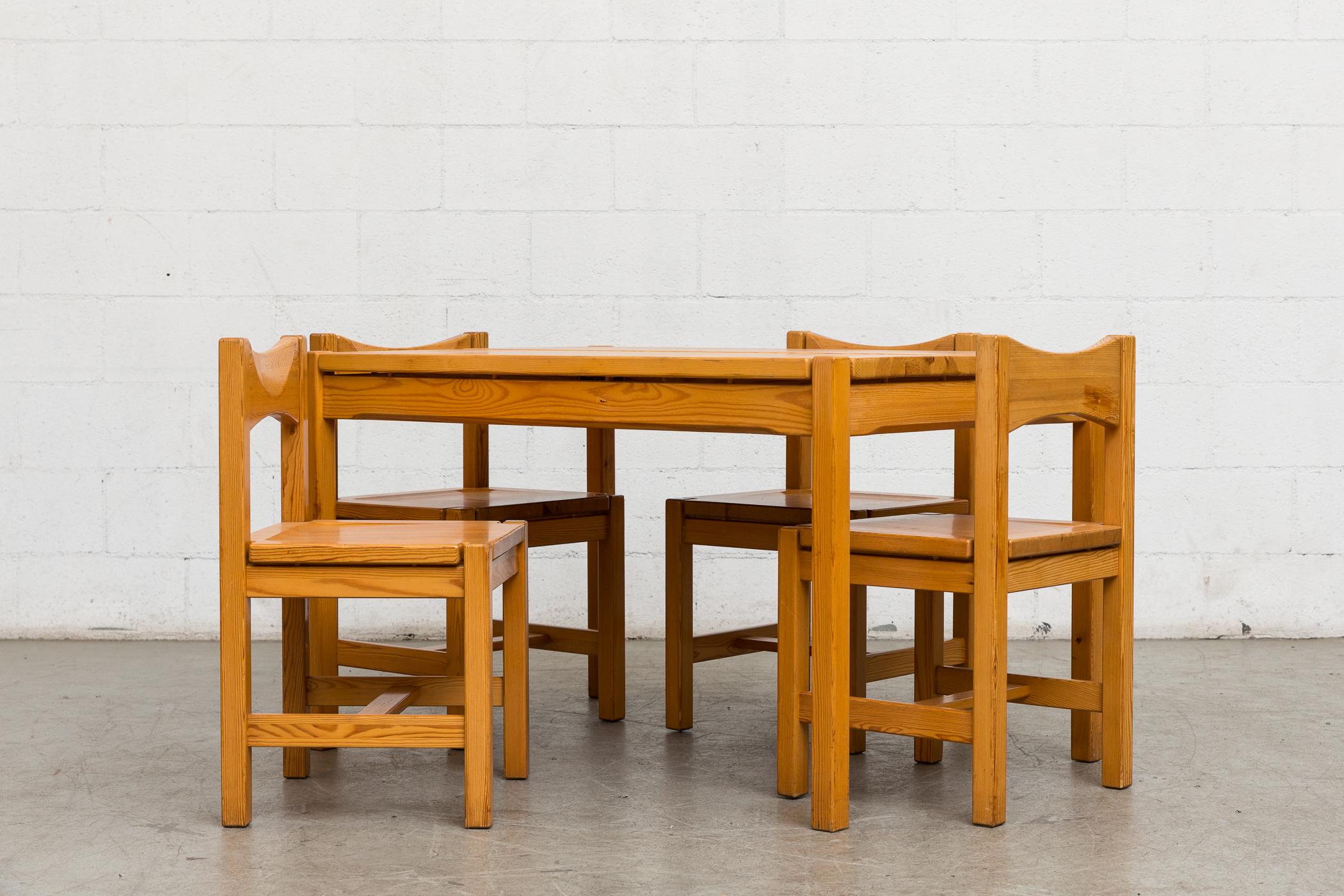 Midcentury pine dining set inspired by Ilmari Tapiovaara. Set consists of one dining table and four matching chairs. Lightly refinished. Good original condition. Set price. Chairs measure: 17.25 x 16.25 x 17/29.5.