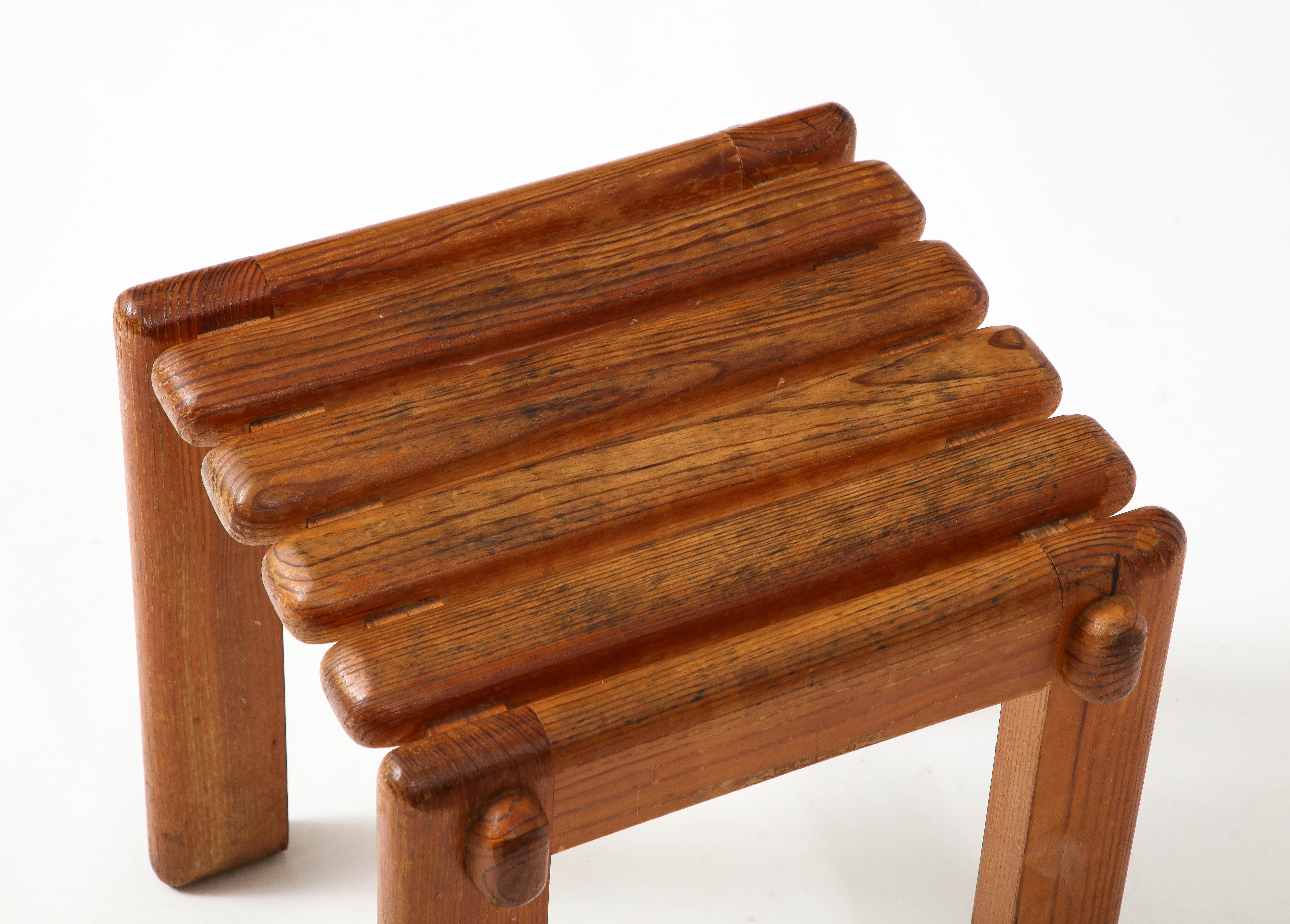 Slat stool in solid oak with interesting details and construction.