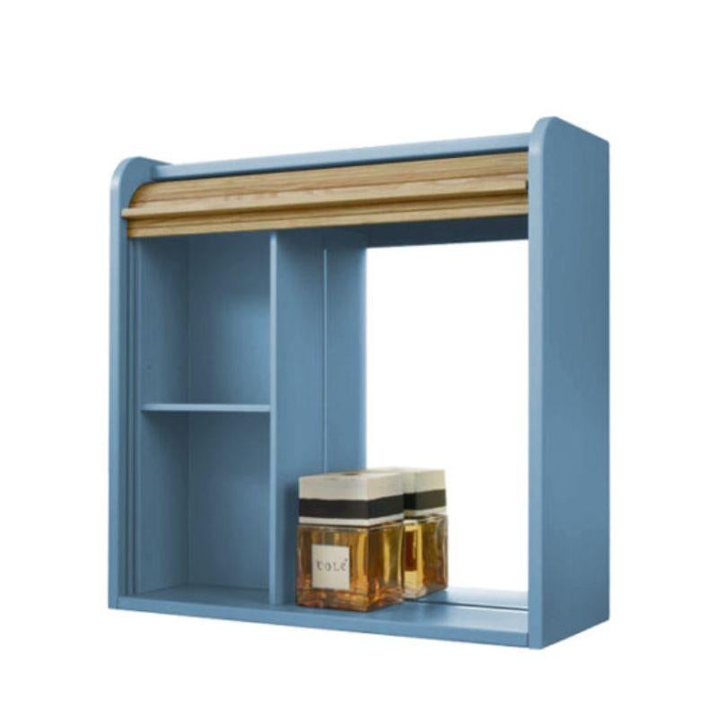 Tapparelle Hanging Unit, Lacquered in Azure by Colé Italia with Emmanuel Gallina
Dimensions: H.60, D.60, W.22 cm
Materials: Container with “tapparella” sliding shutter in solid oak. Matt lacquered structure
1 veneered oak shelf inside. Optional