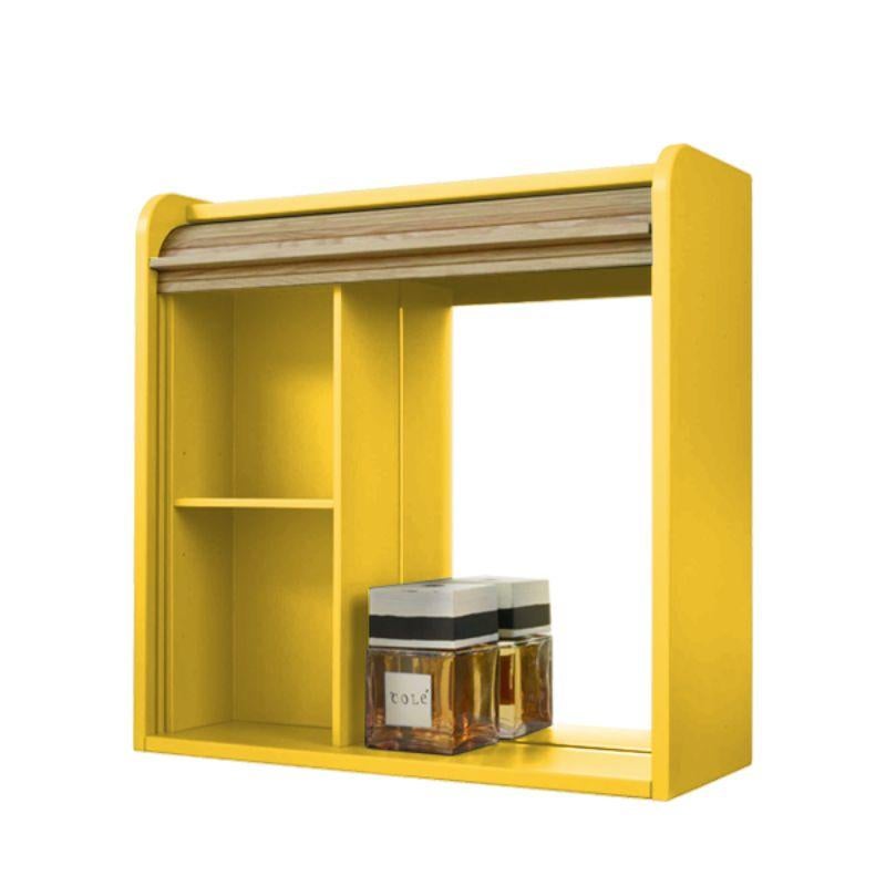 Tapparelle hanging unit, Lacquered in mustard yellow by Colé Italia with Emmanuel Gallina
Dimensions: H.60, D.60, W.22 cm
Materials: Container with “tapparella” sliding shutter in solid oak. Matt lacquered structure
1 veneered oak shelf inside.