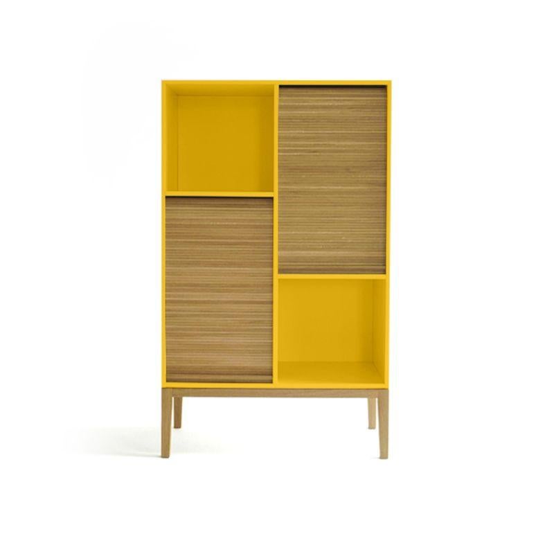 Tapparelle large cabinet, mustard yellow by Colé Italia with Emmanuel Gallina
Dimensions: H.135, D.46, W.78 cm.
Materials: Container with legs and “tapparella” sliding shutter in solid oak.
Matt lacquered structure; inside 2 oak veneered