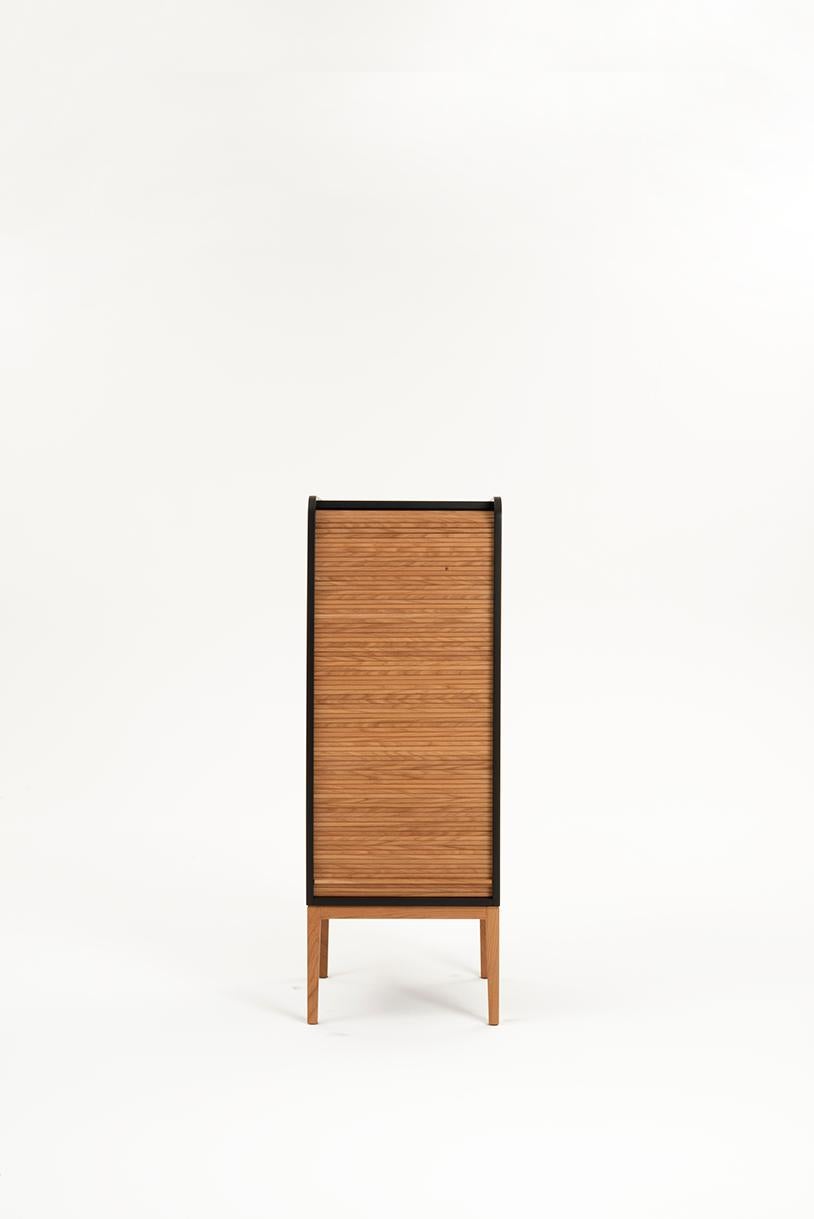 Tapparelle is a collection of cabinets that explore the traditional technique of old office furniture with tambour sliding shutters no longer in use, turning them into furniture for the contemporary home with soft and unusual lines.
The base has