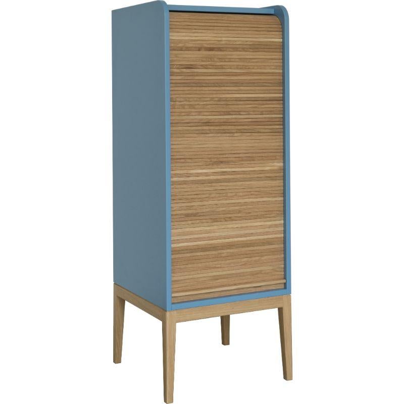 Tapparelle Medium cabinet, Azure by Colé Italia with Emmanuel Gallina
Dimensions: H.115 D.42 W.42 cm
Materials: Container with legs and “tapparella” sliding shutter in solid oak.
Matt lacquered structure; inside 2 oak veneered shelf

Also available: