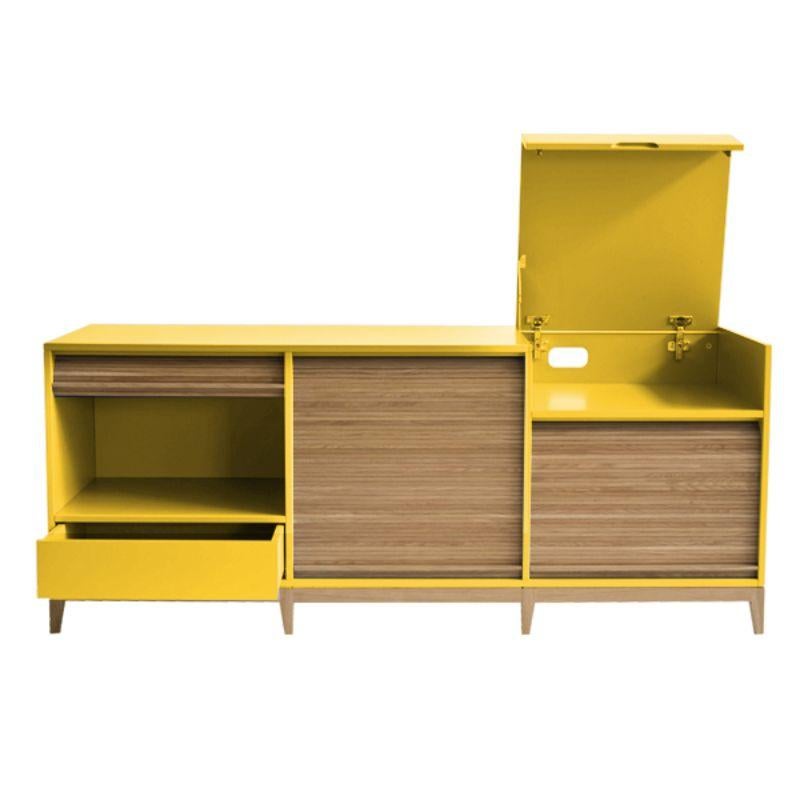 Tapparelle sideboard, mustard yellow by Colé Italia with Emmanuel Gallina
Dimensions: H.75 D.50 W.160 cm
Materials: Container with legs and “tapparella” sliding shutter in solid oak. Matt lacquered structure;
1 push-pull drawer and a a folding