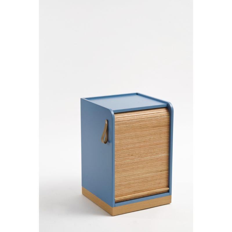 Tapparelle wheels cabinet, Azure by Colé Italia with Emmanuel Gallina
Dimensions: H.55 D.40 W.40 cm
Materials: Container on wheels with plinth and “tapparella” sliding shutter in solid oak.
Matt lacquered structure; handle in leather; inside 1