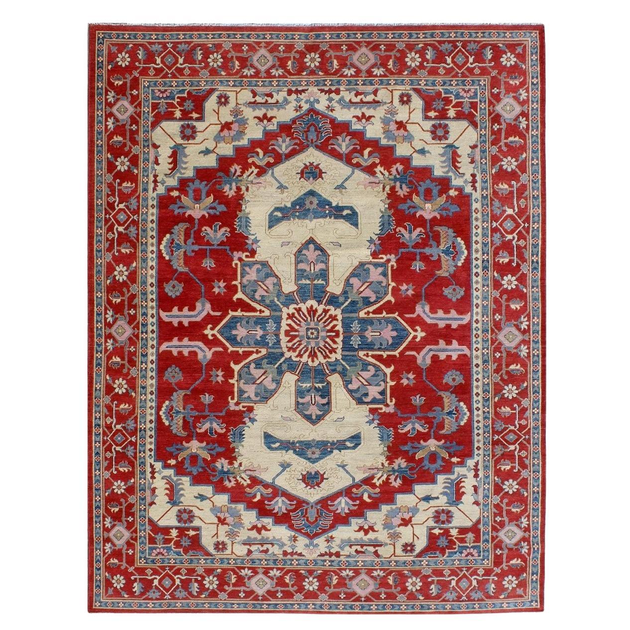 Hand-knotted carpet design inspired by ancient Serapis red and blue tones