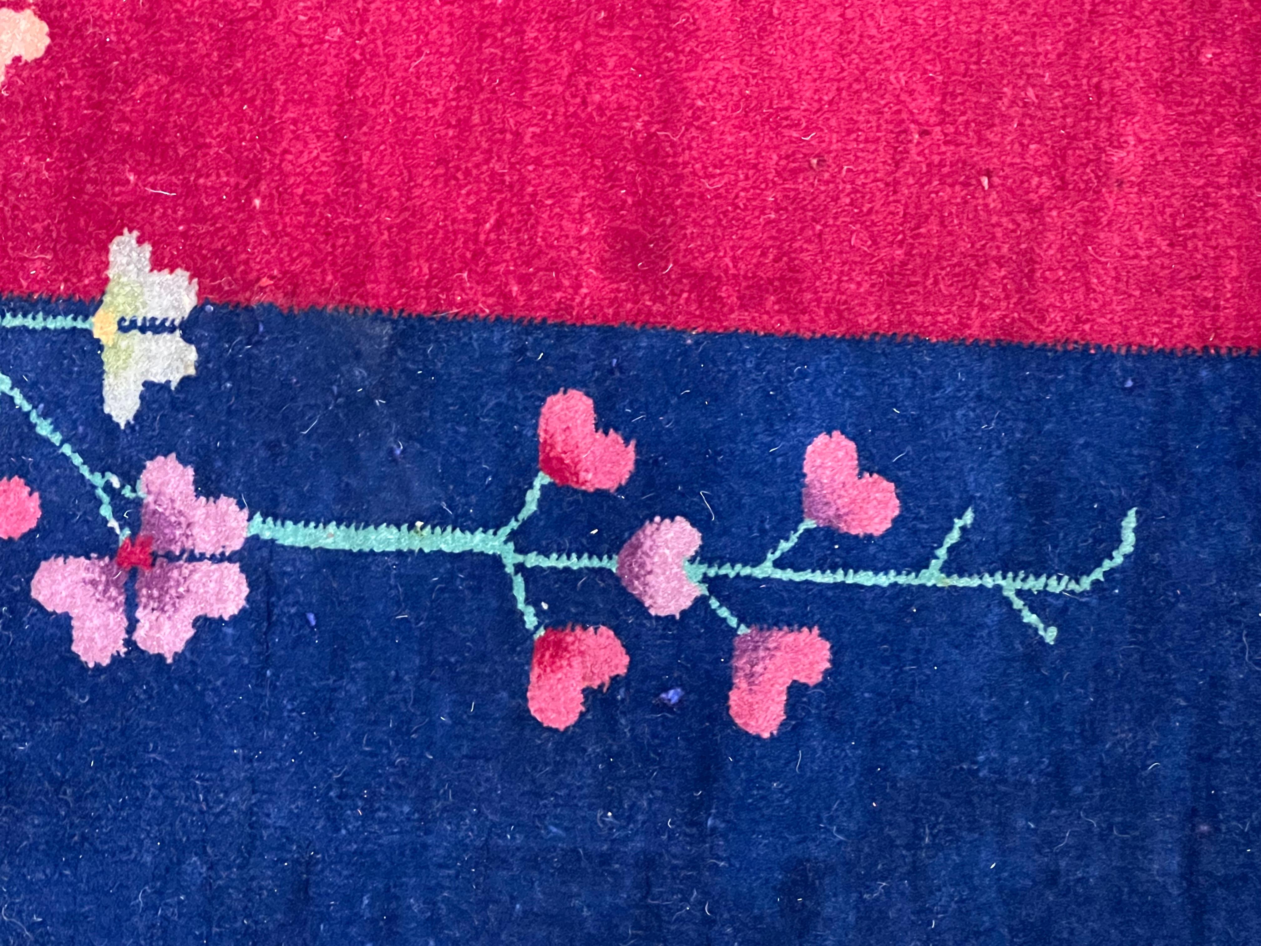 Chinese Art Deco' rug deep red background, blue border and colorful flower cascade For Sale