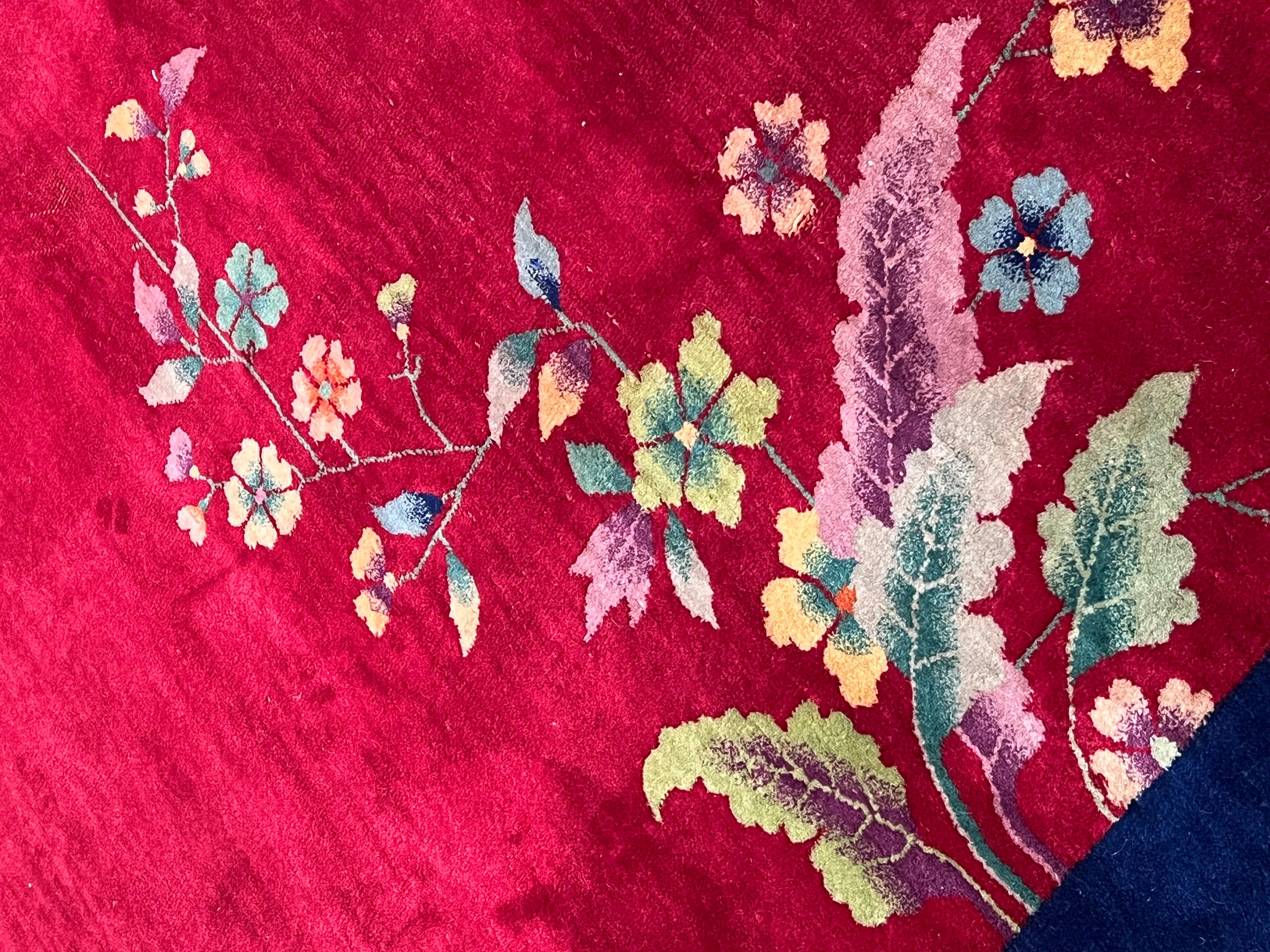 Art Deco' rug deep red background, blue border and colorful flower cascade In Fair Condition For Sale In Firenze, IT