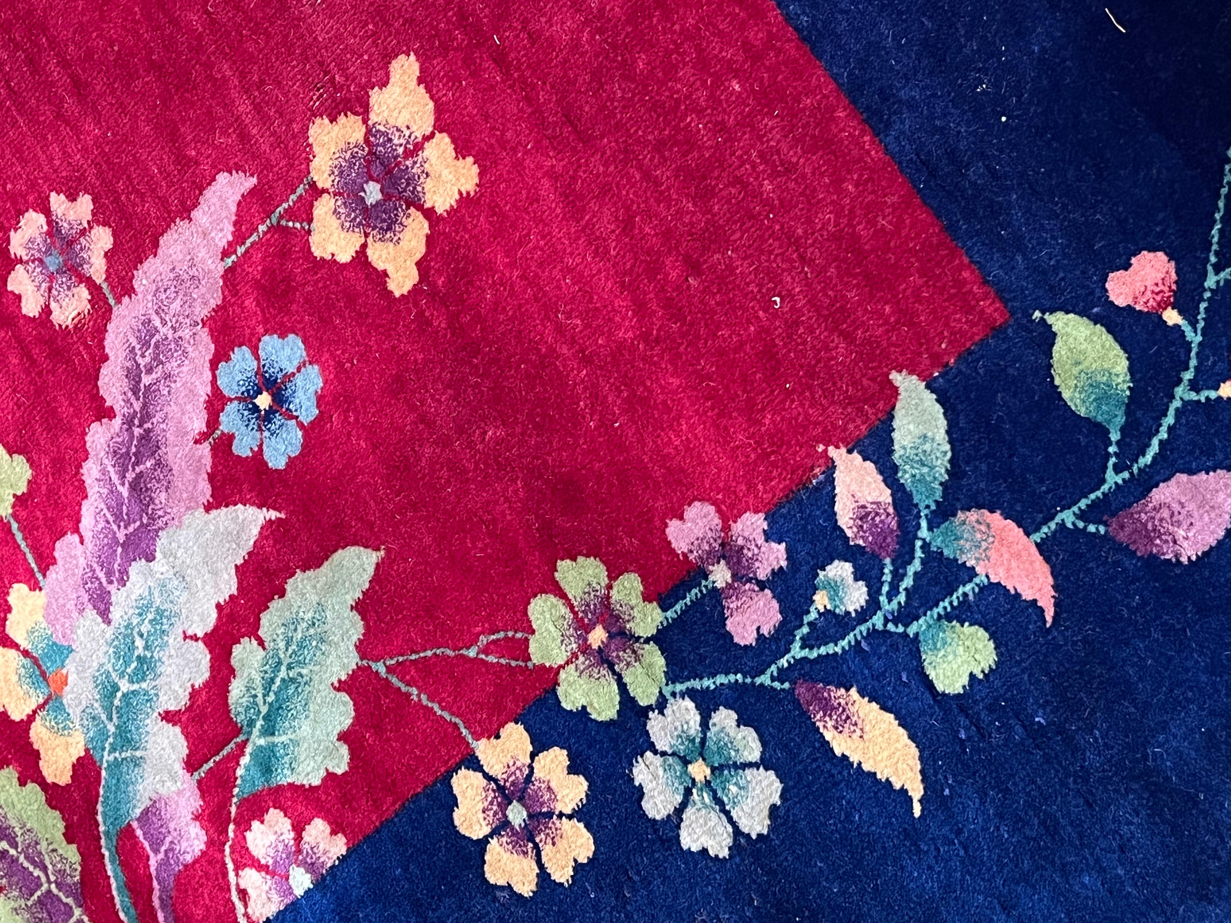 Early 20th Century Art Deco' rug deep red background, blue border and colorful flower cascade For Sale