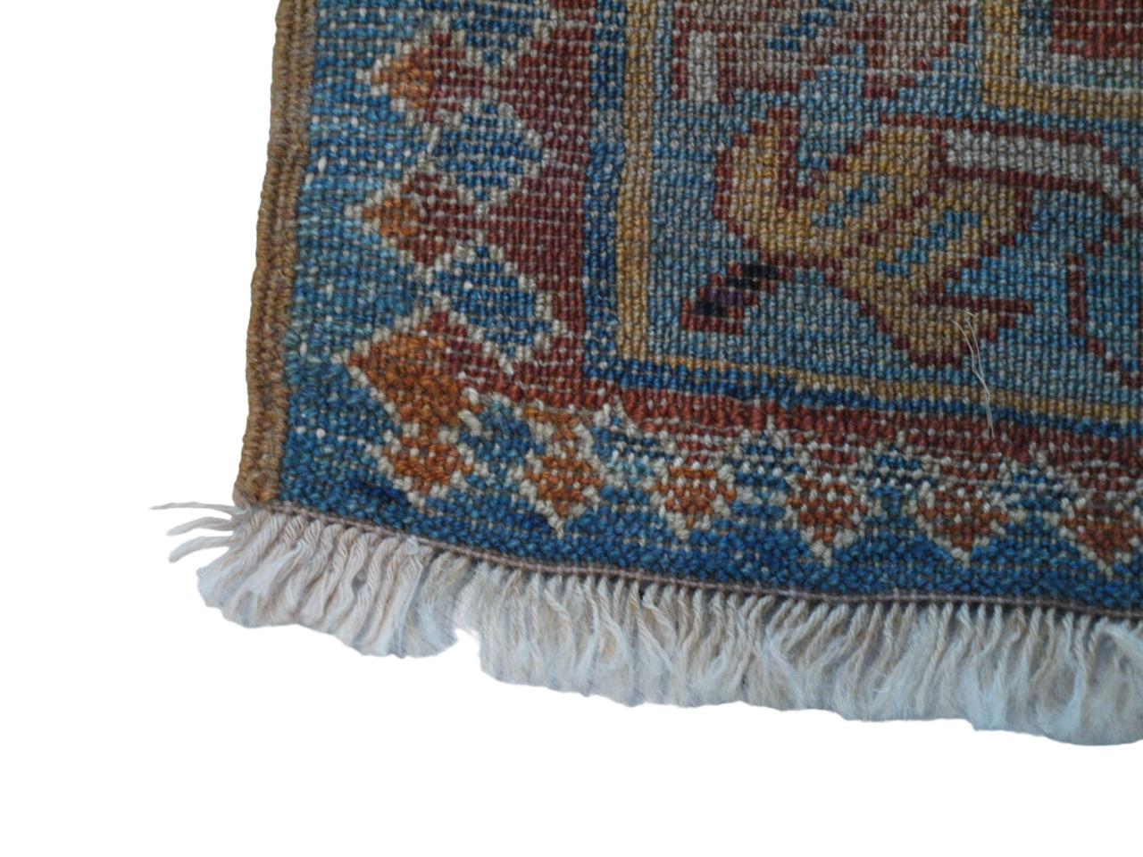 A hand-knotted Caucasian rug is a handcrafted masterpiece from the Caucasus region, a mountainous area between the Black Sea and the Caspian Sea. These carpets are known for their exceptional quality, durability and artistic beauty, reflecting the
