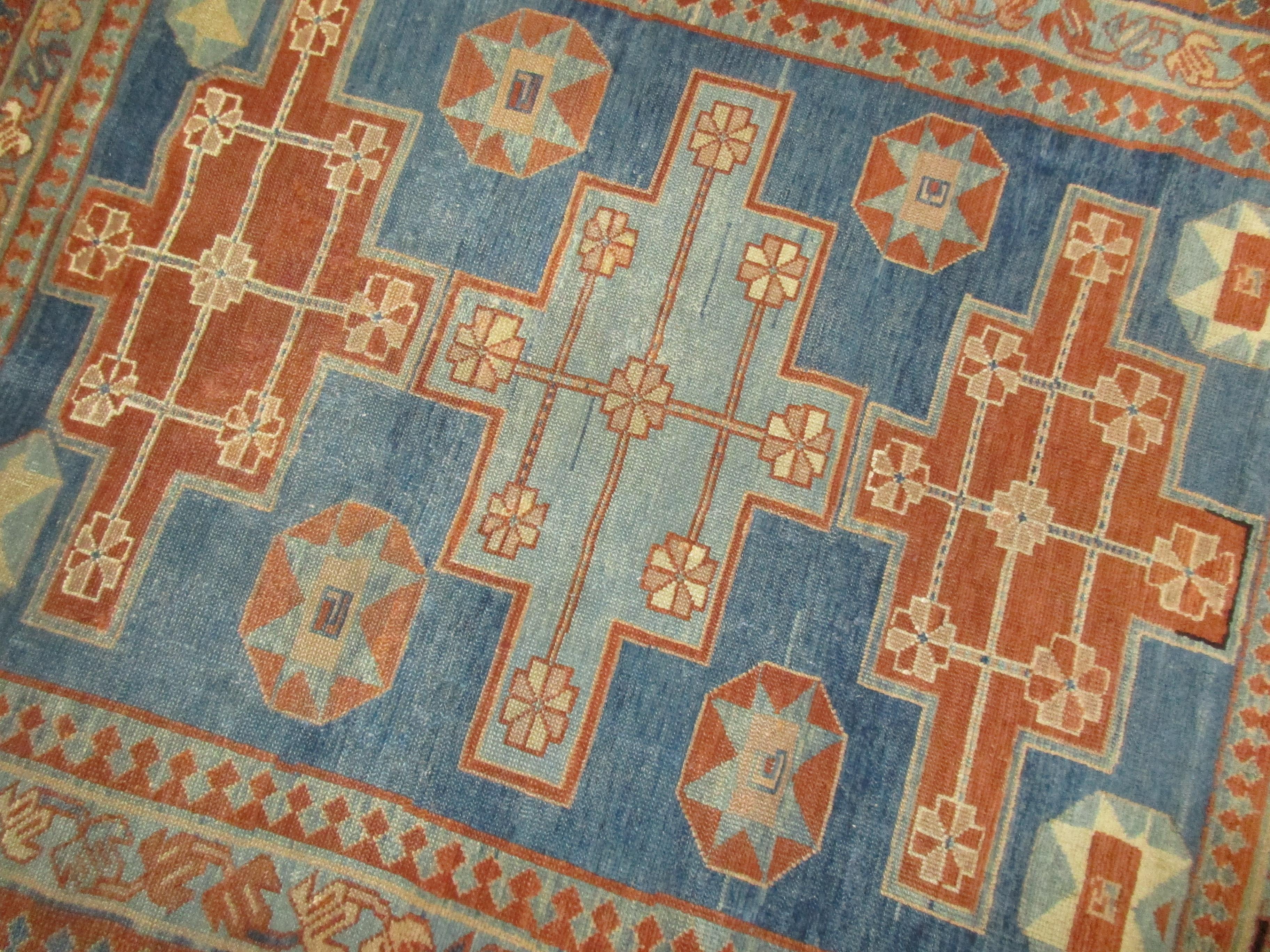 Mid-20th Century Blue hand-knotted Caucasian rug For Sale