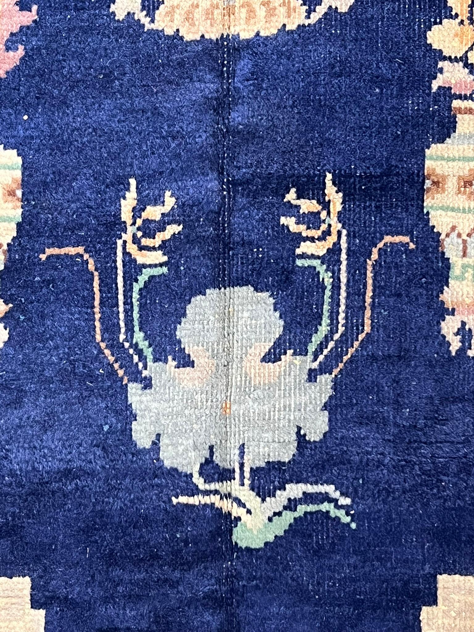 Vietnamese Carpet with light blue background and Chinese design from the 1930s For Sale