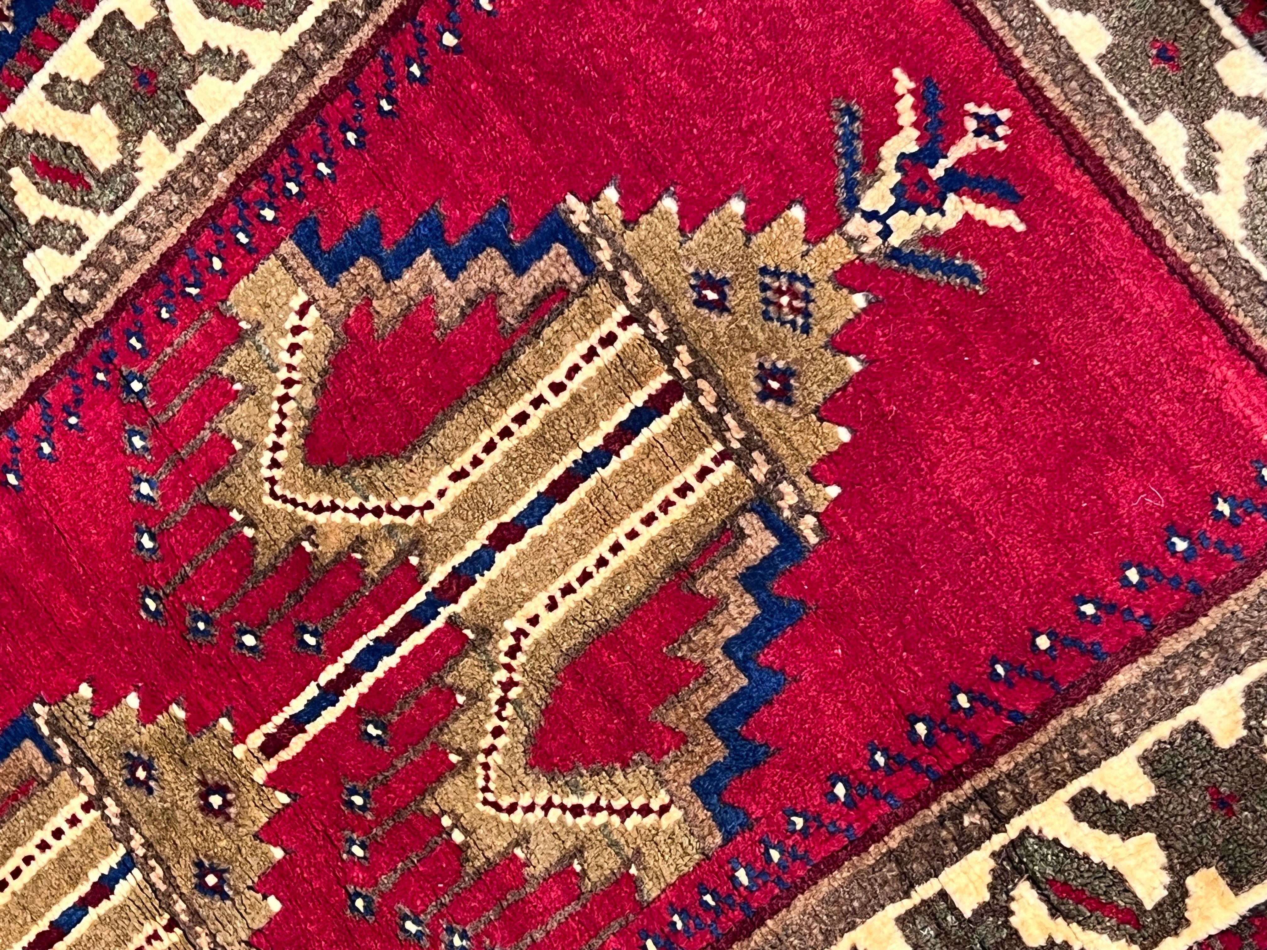 Hand-Knotted Ruby red background prayer rug of Anatolian manufacture For Sale
