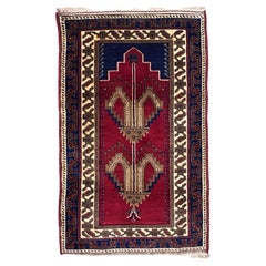 Ruby red background prayer rug of Anatolian manufacture