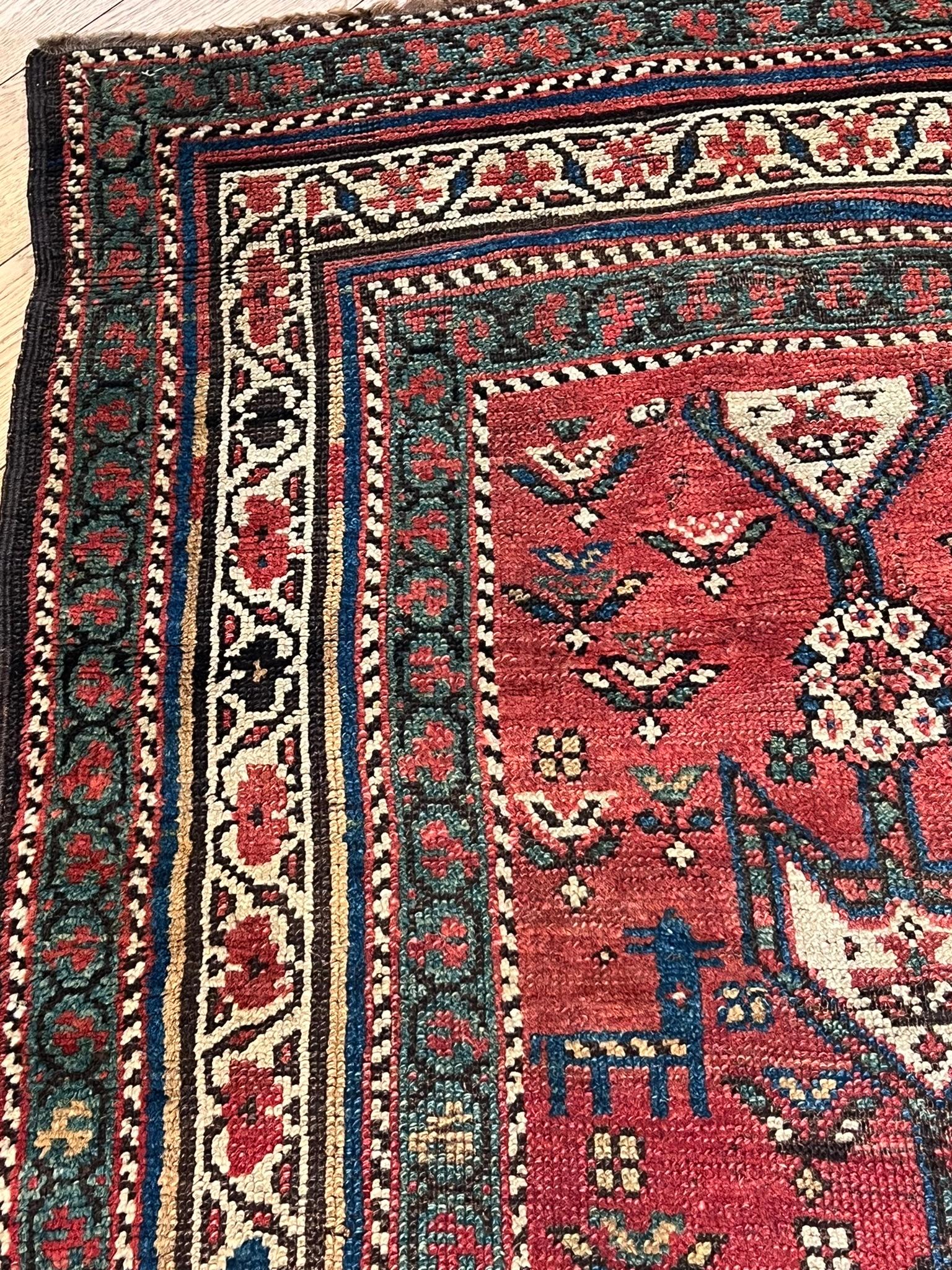 Azerbaijani Shahsavan tribal manufacture carpet with red background and zoomorphic motifs For Sale