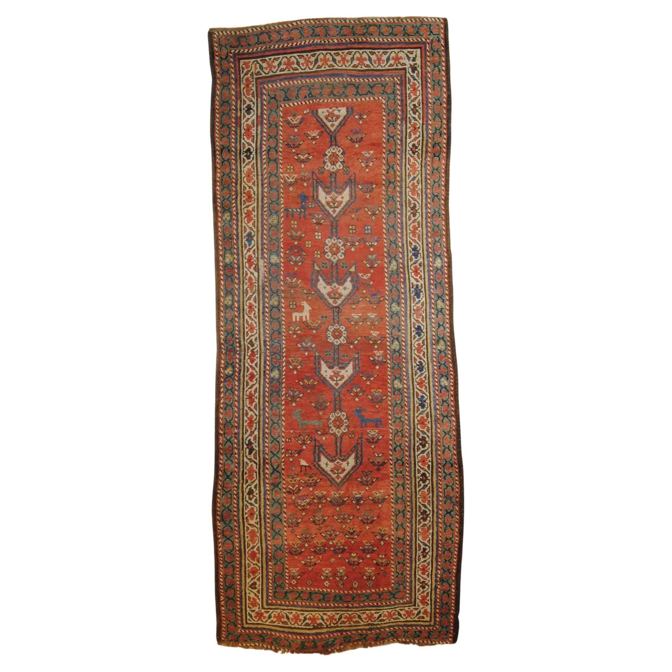 Shahsavan tribal manufacture carpet with red background and zoomorphic motifs For Sale