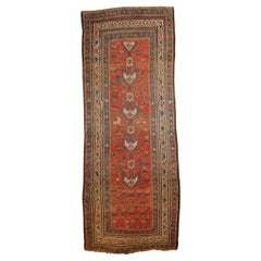 Shahsavan tribal manufacture carpet with red background and zoomorphic motifs