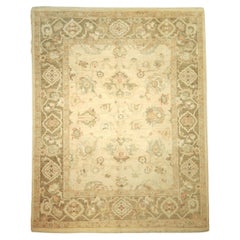 Light-colored background rug with rotten green border traditional design without medallion