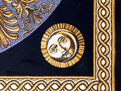 Fornasetti "Sole Luna" rug on black background and gold ramage
