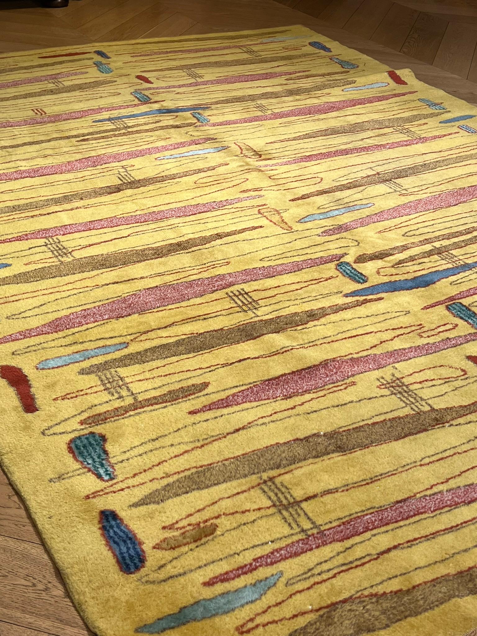 Turkish Mustard yellow rug with abstract designs of various colors designer ZEKI MUREN For Sale