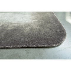 Tappeto moderno design sostenibile grigio bordo von Deanna Comellini 200x300cm