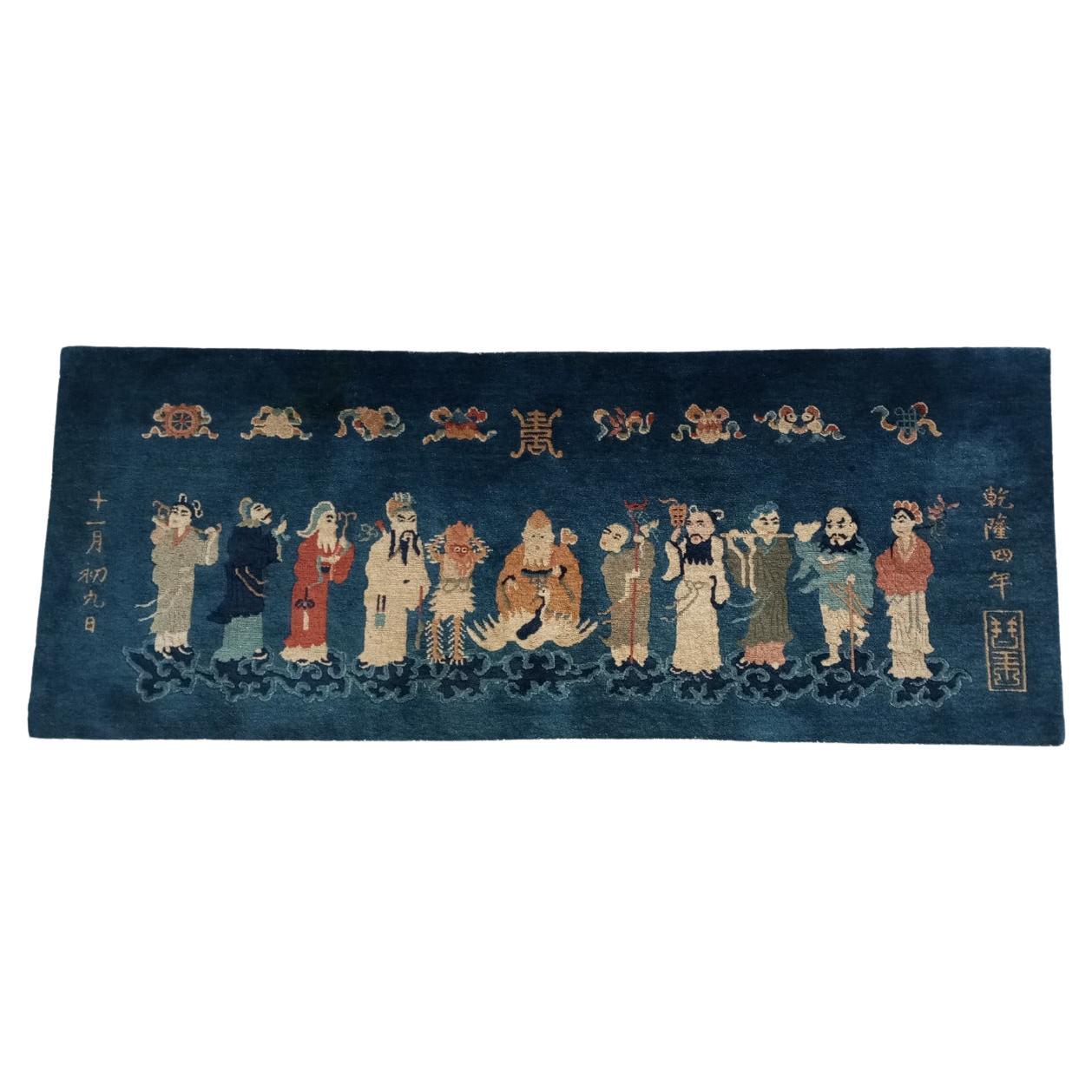 Orientalischer Bildteppich mit Inschriften und Symbolen, aus Wolle. China