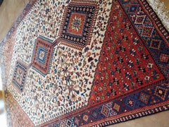 Hand-knotted Persian rug with geometric medallion Yalameh Rug