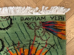 Green and orange designer rug from the 1970s signed Zeki Muren
