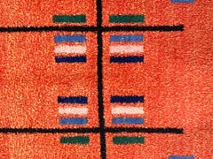 Tappeto Zeki Muren ani '70 color rancio e motivi decorativi astratti futuristi