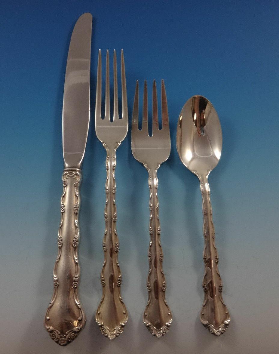 Monumental Tara by Reed and Barton sterling silver flatware set of 107 pieces. This set includes:

12 knives, 9 1/8