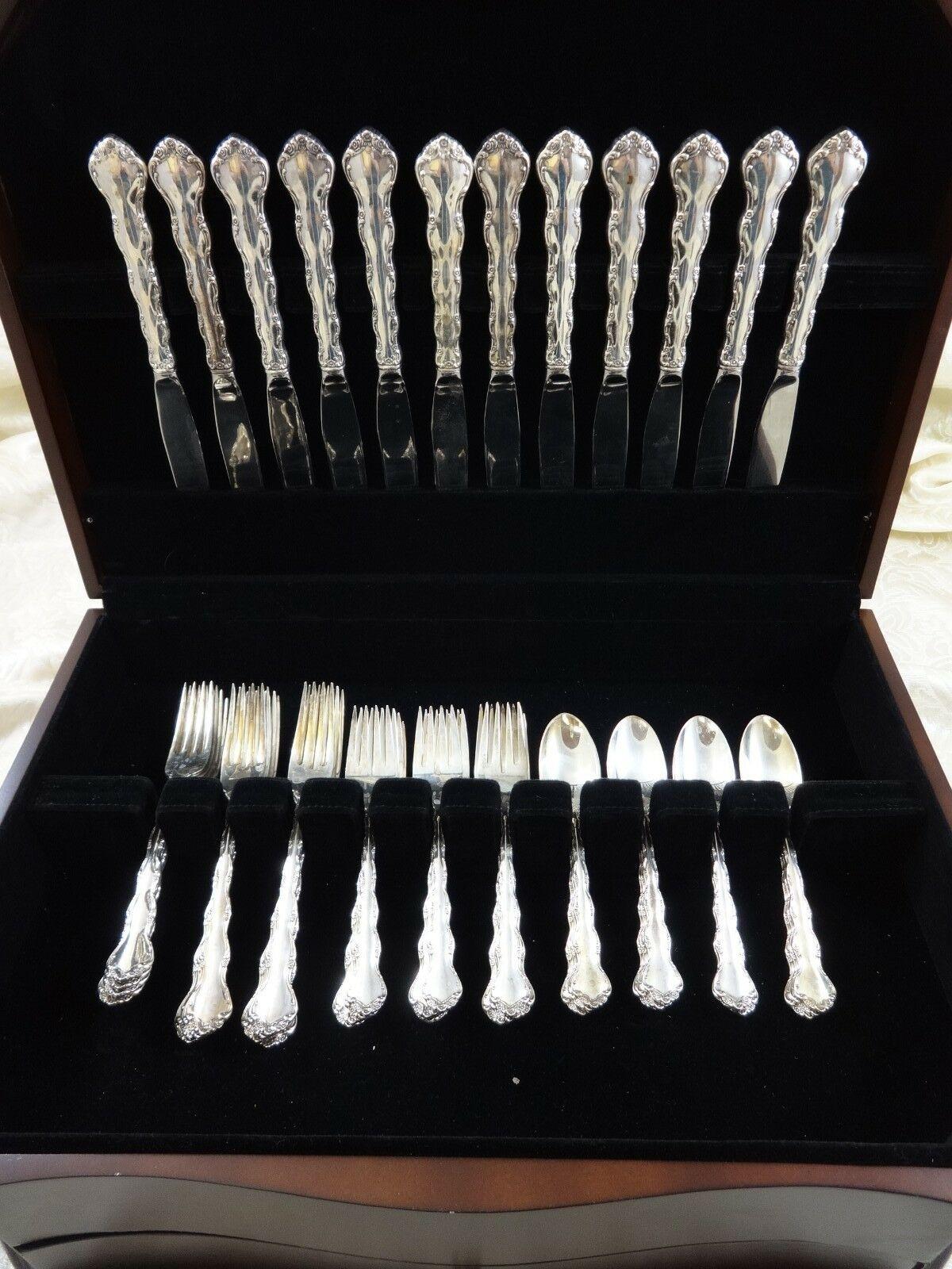 Beautiful Tara by Reed & Barton sterling silver flatware set - 57 pieces. This set includes:
  
12 knives, 9