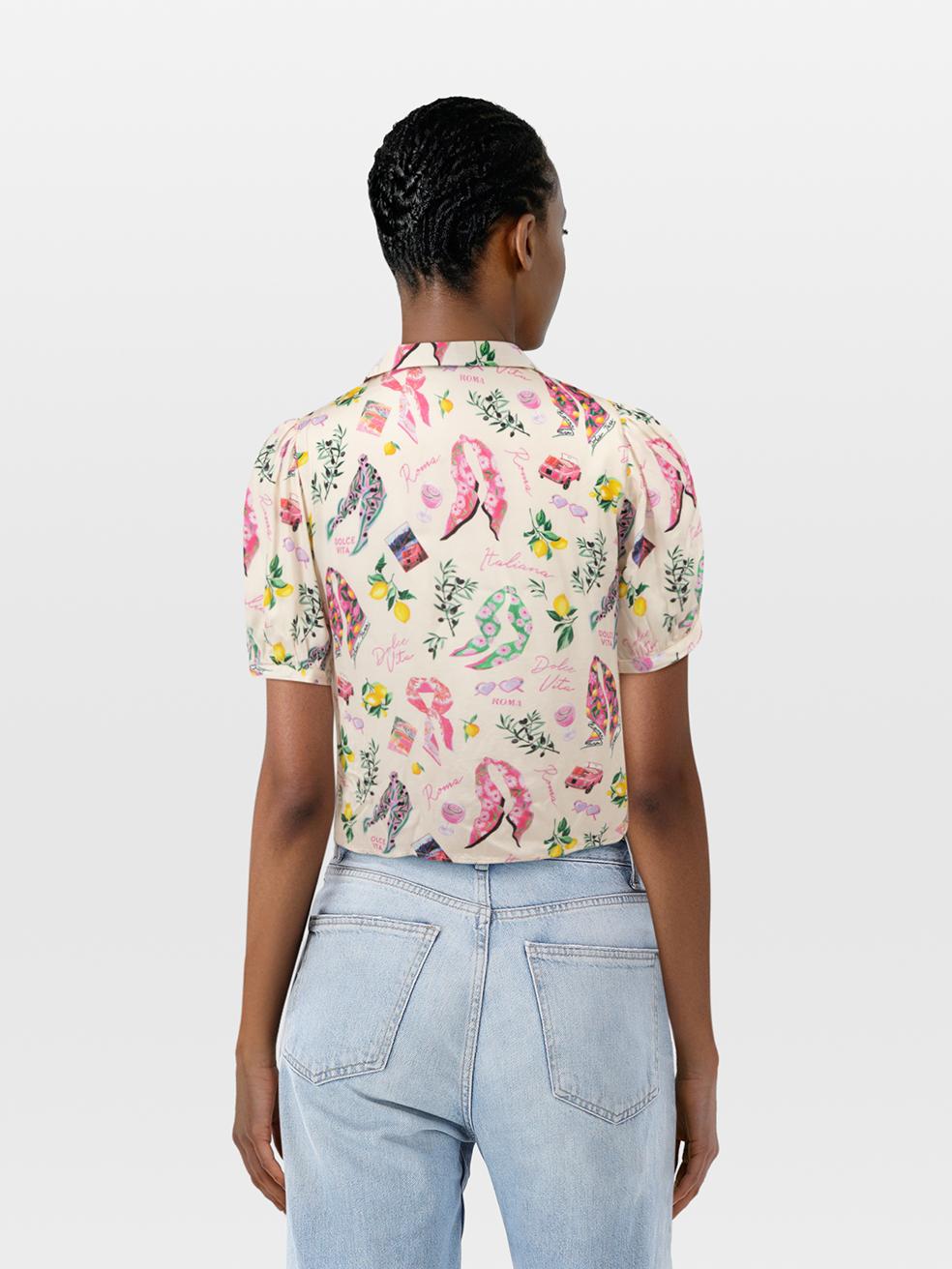 CONDITION is Very Good. Hardly any visible wear to the top is evident on this used Tara Jarmon designer resale item.
 
 Details
 
 
 Multicolour
 
 Viscose
 
 Shirt
 
 Short sleeves
 
 V neck
 
 'Dolce Vita' print
 
 Abstract print
 
 Waist tie