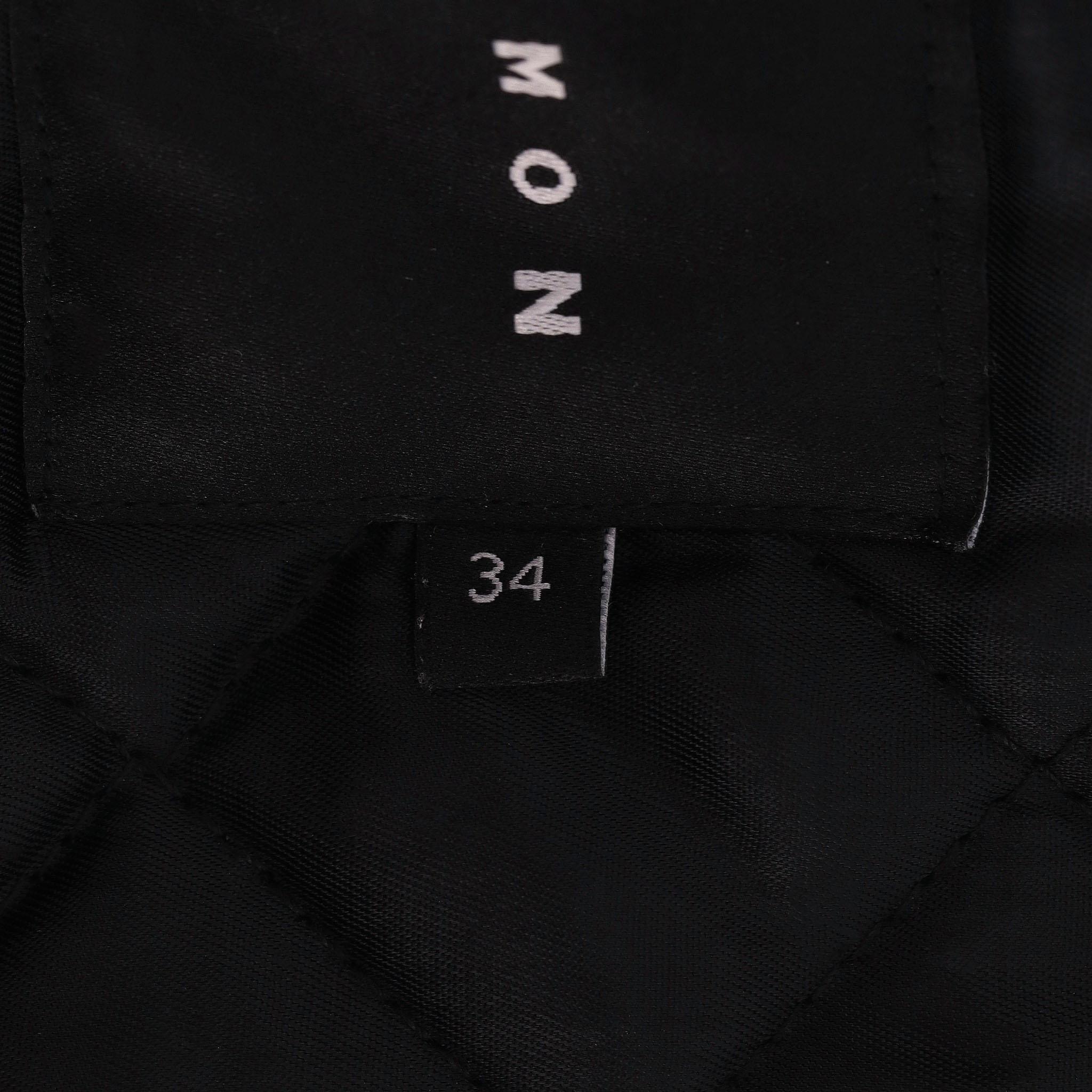 Chaqueta parka Tara Jarmon con capucha ribeteada de mapache en venta 1