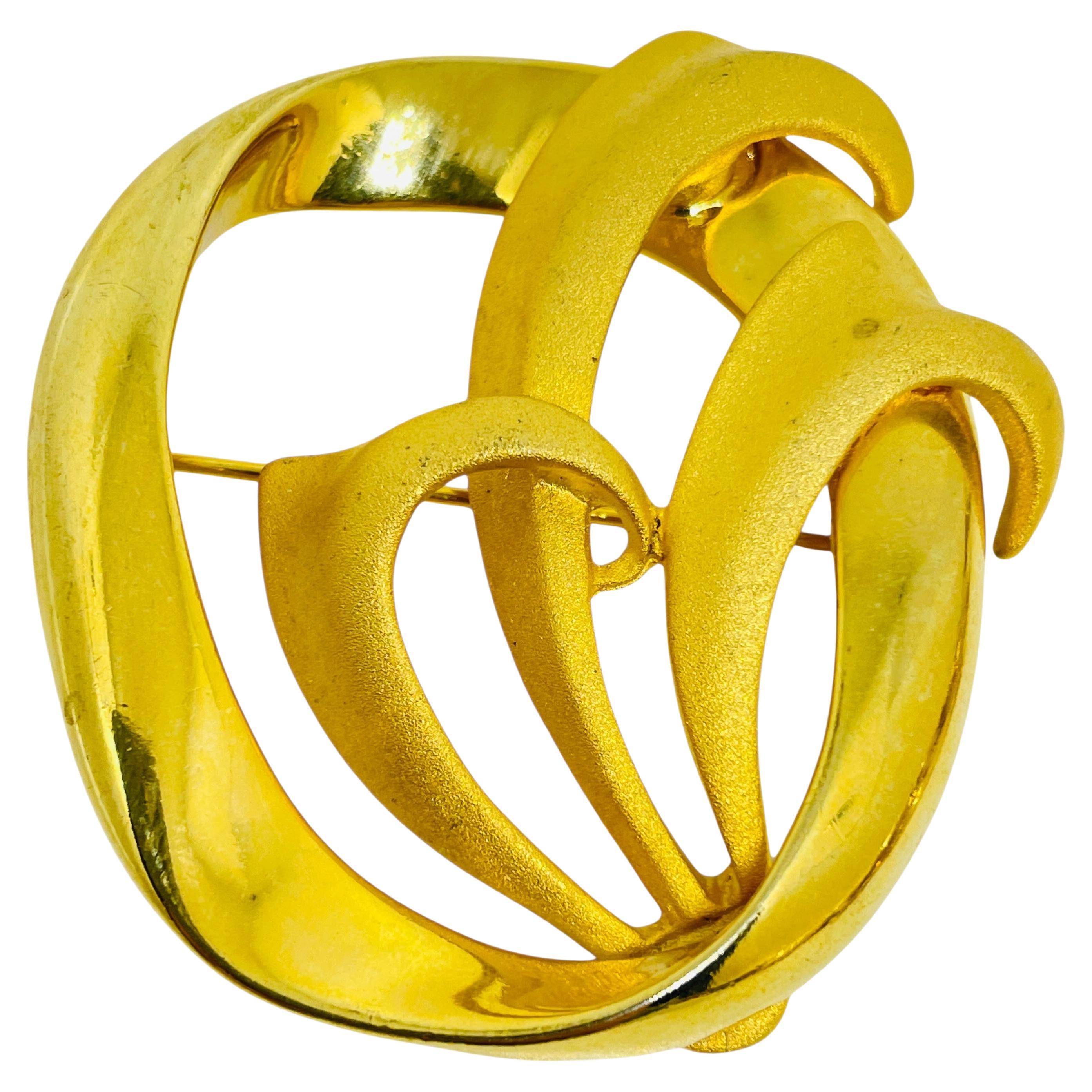 TARA signed vintage gold tone designer brooch