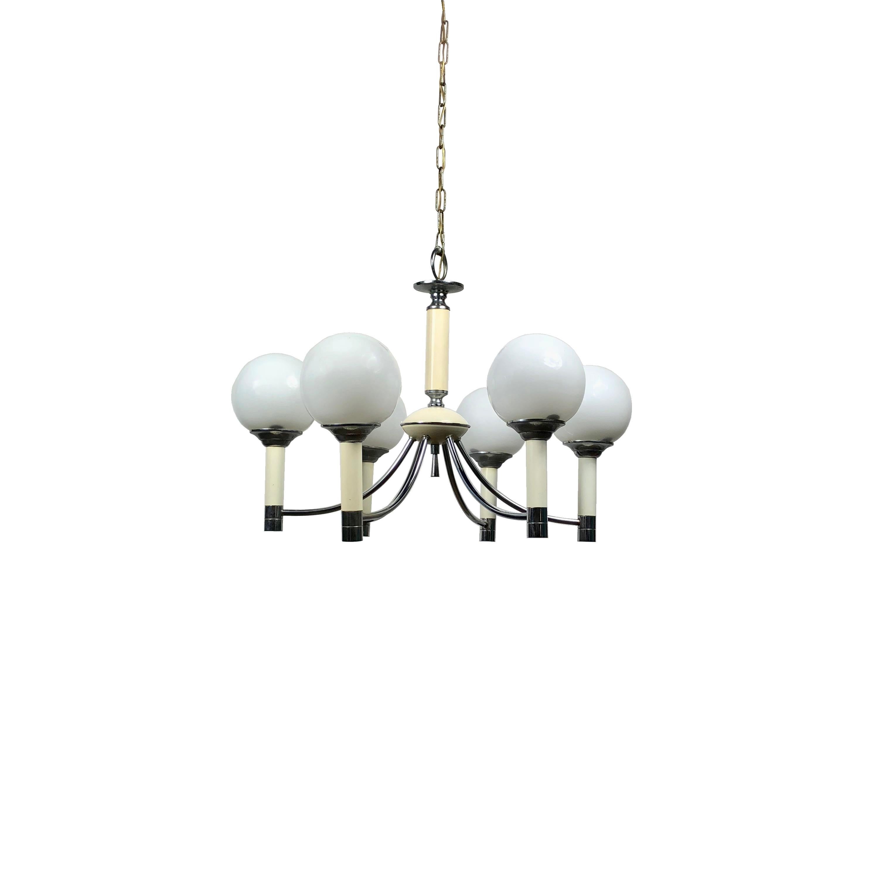 A Targetti cream enamel, chrome and frosted glass chandelier with six lights.