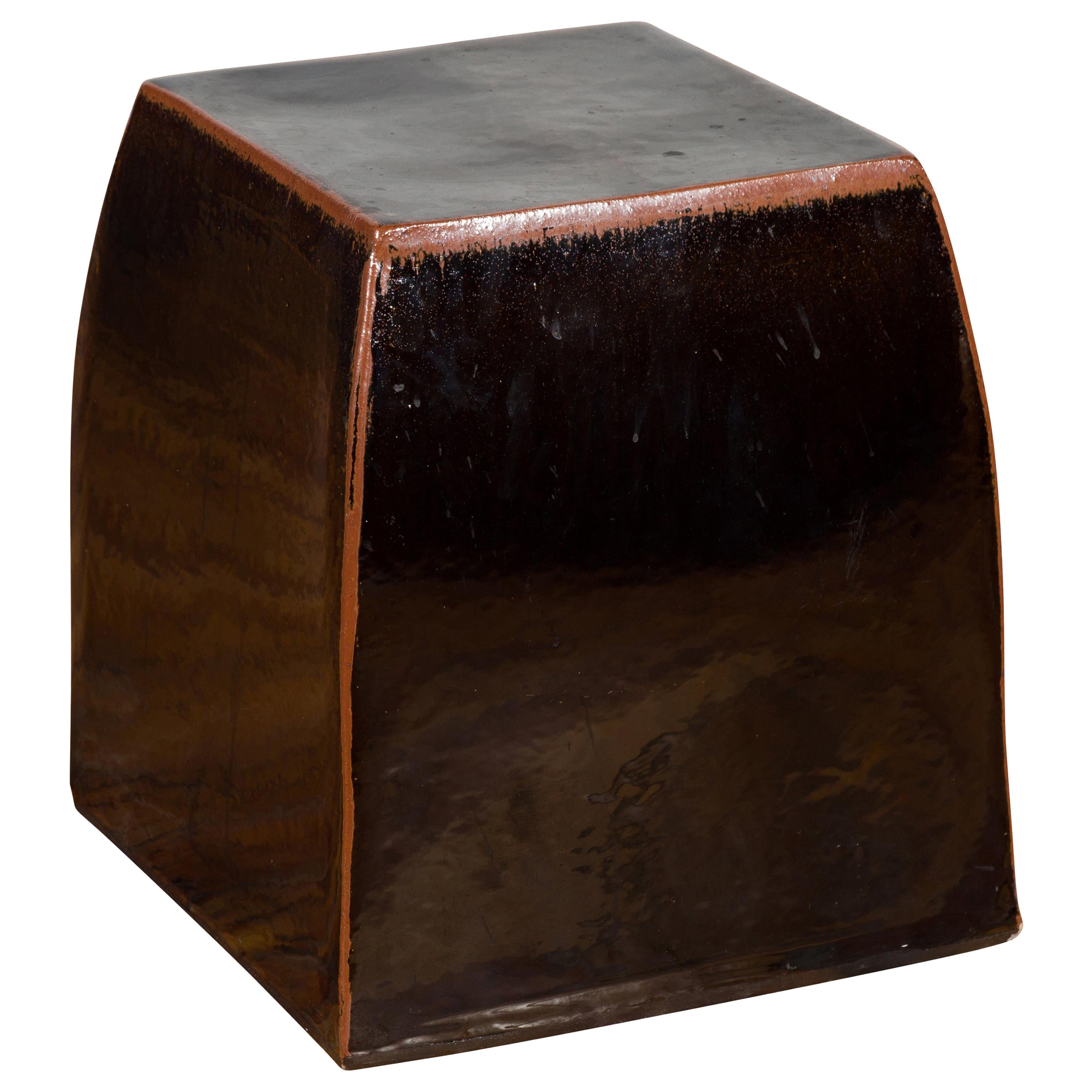 Tariki Ceramic Black Garden Seat with Brown Accents and Sleek Lines For Sale