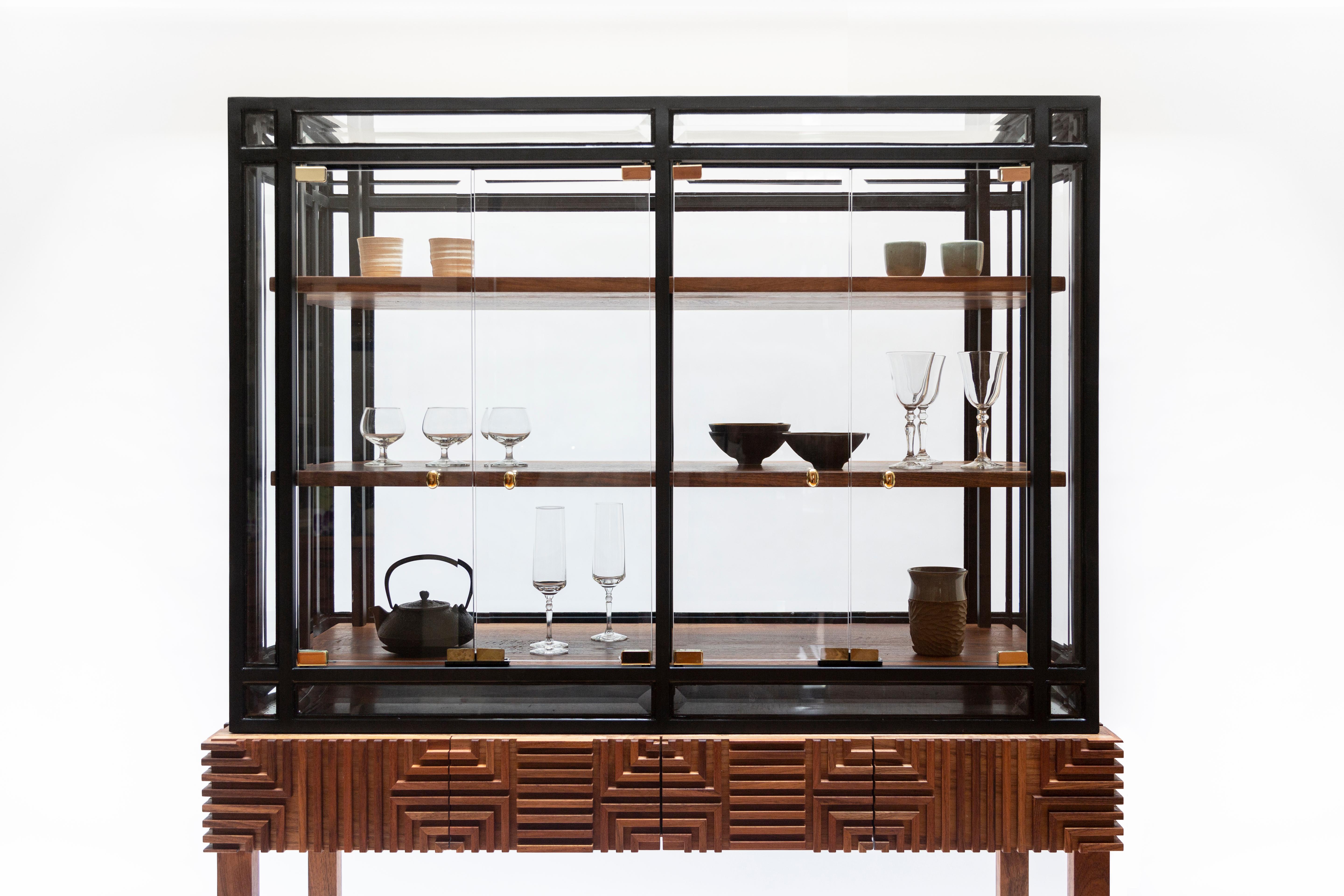 The Tarlow cabinet was originally designed for Mexico DesignWeek in which the creators referenced antique glass cabinets and won an Honorable Mention. The Tarlow cabinet is composed of two bodies and materials that are juxtaposed creating a new